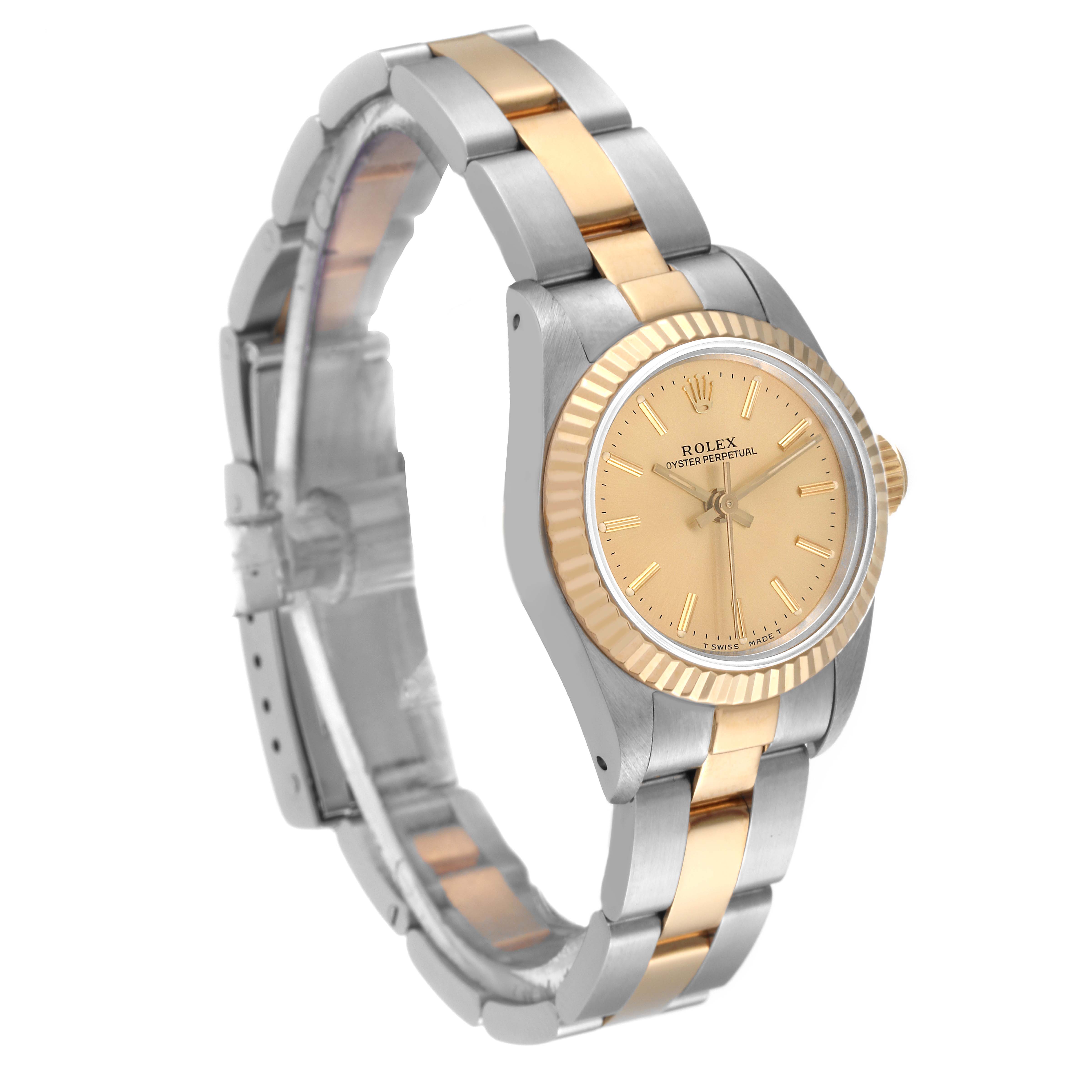 The Rolex Oyster Perpetual 67193 Women's Steel and Gold (two tone) Champagne Dial 67193 Women's Steel and Gold (two tone) Champagne Dial watch is shown at a slight angle, displaying the face, bezel, crown, and two-tone bracelet.