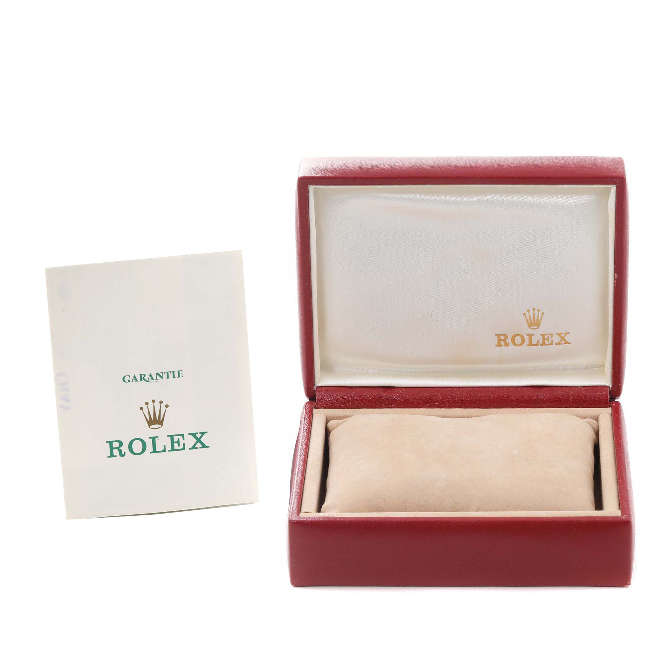 The image shows a red watch box and warranty card for a Rolex Oyster Perpetual 67193 Women's Steel and Gold (two tone) Champagne Dial 67193 Women's Steel and Gold (two tone) Champagne Dial model.
