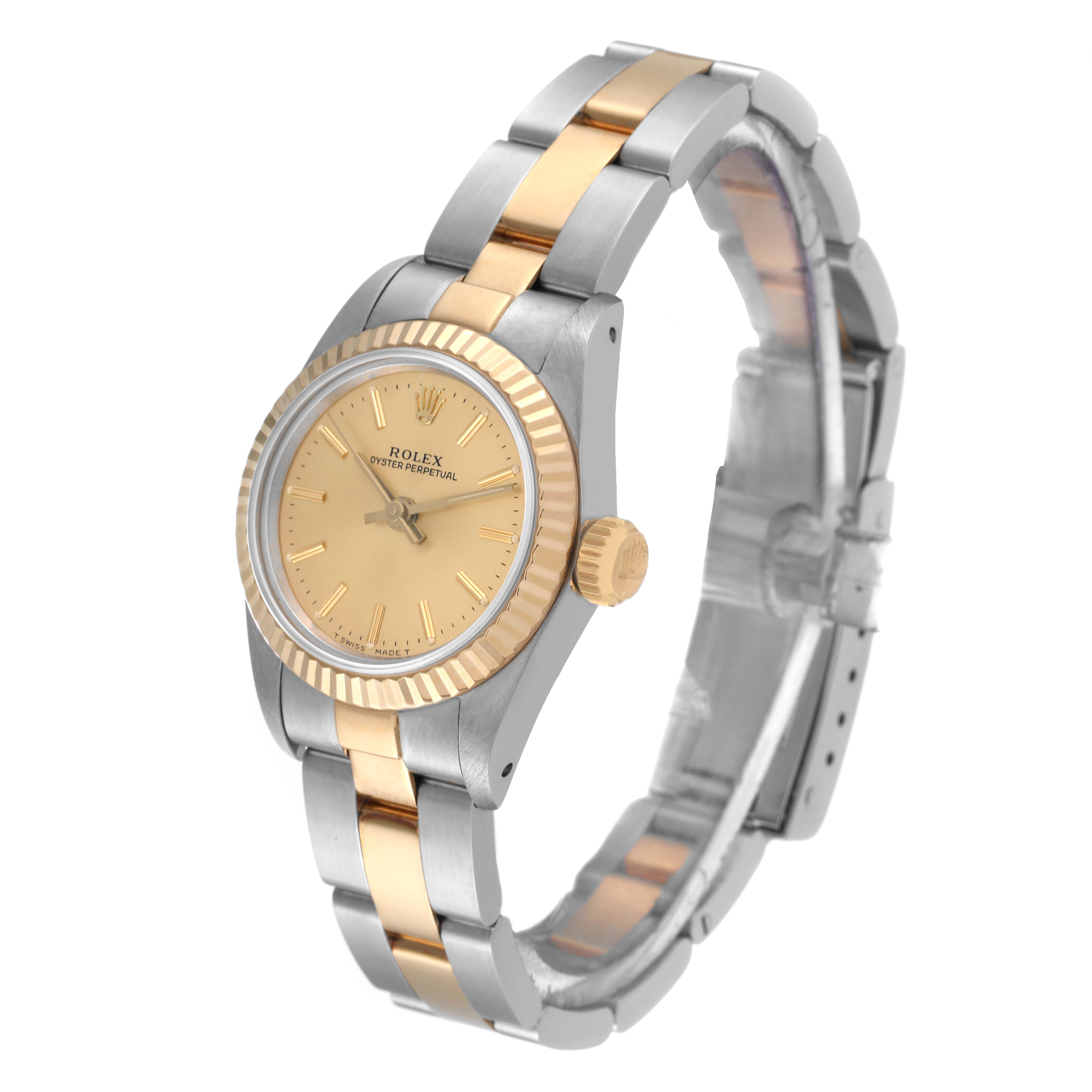 The image shows a side angle of the Rolex Oyster Perpetual 67193 Women's Steel and Gold (two tone) Champagne Dial 67193 Women's Steel and Gold (two tone) Champagne Dial watch, highlighting the face, bezel, crown, and part of the bracelet.