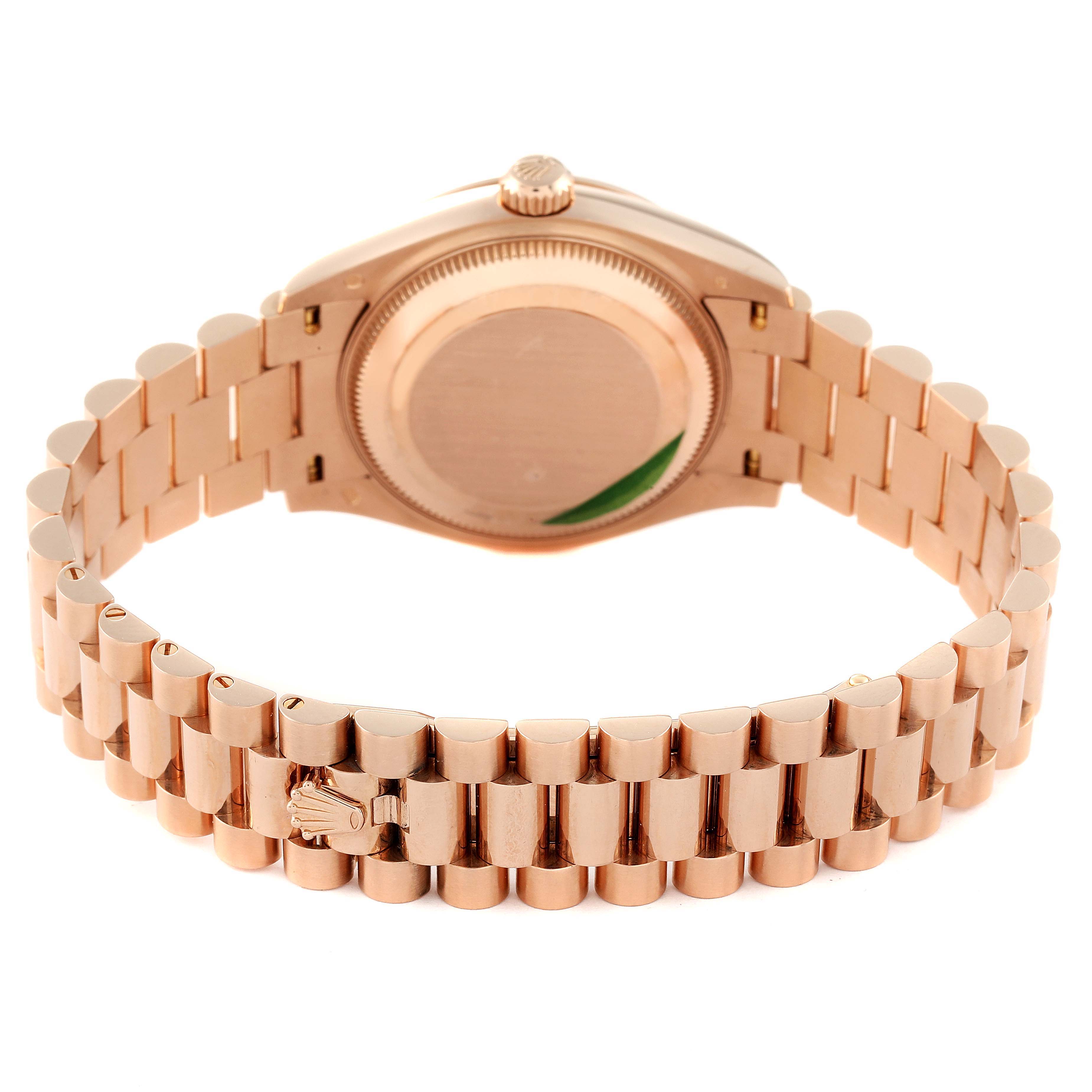 The image shows the back view of the Rolex President 278275 Women's Rose Gold Blue Dial 278275 Women's Rose Gold Blue Dial model watch, emphasizing the case back and bracelet.