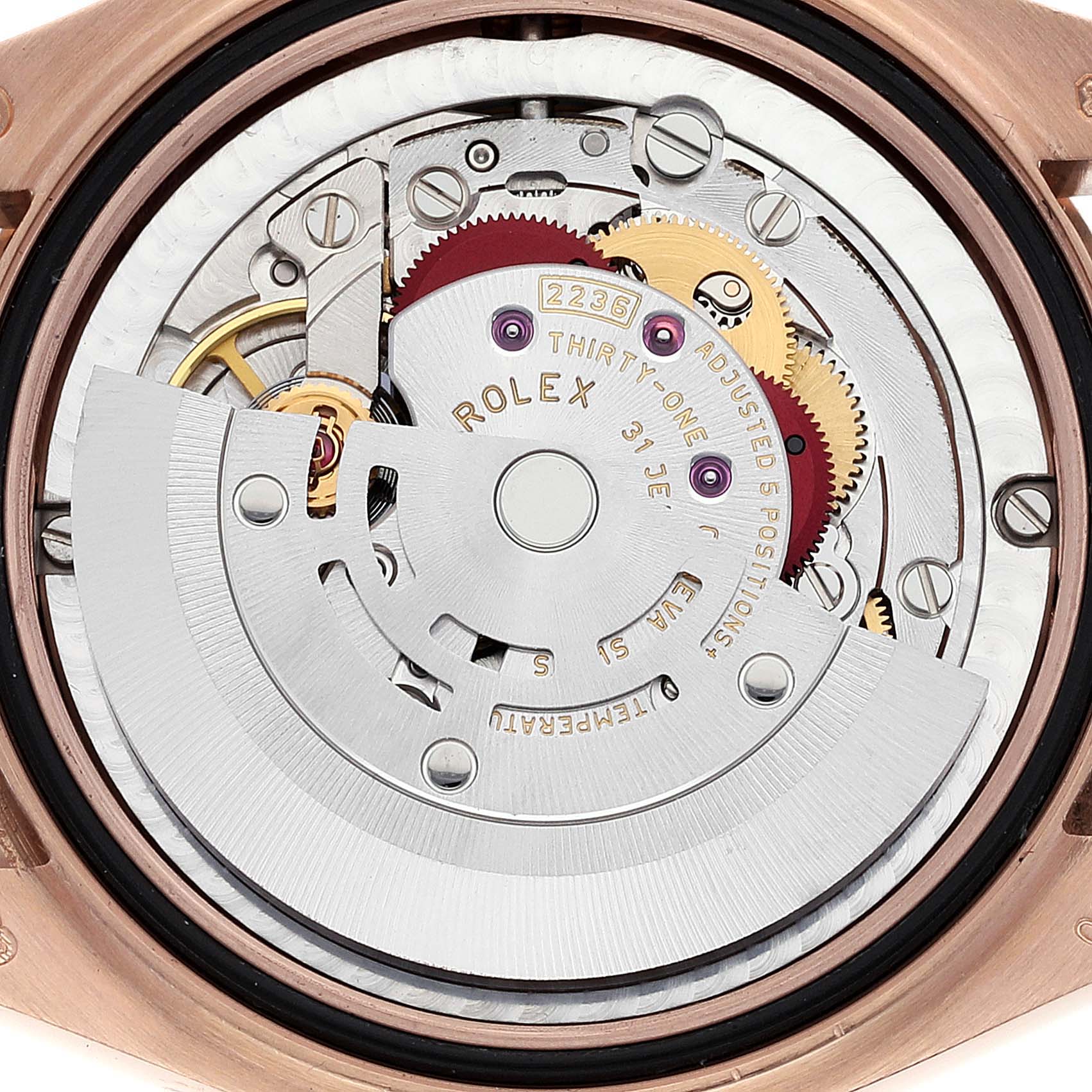 This image shows the internal mechanism of the Rolex President 278275 Women's Rose Gold Blue Dial 278275 Women's Rose Gold Blue Dial model, highlighting the movement's intricate components from a top-down view.