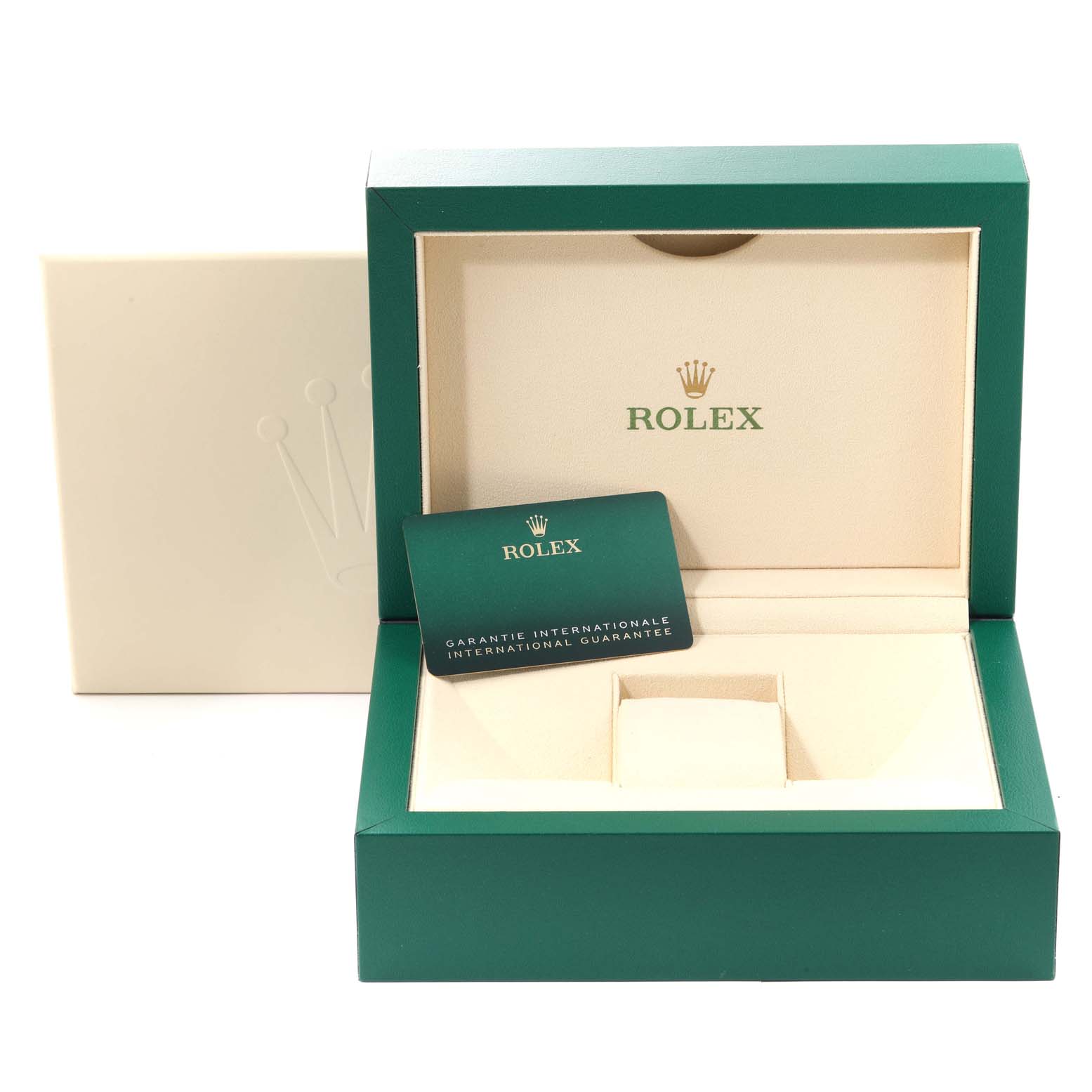 The image shows an open green and beige Rolex watch box and a warranty card, but not the actual President model watch.