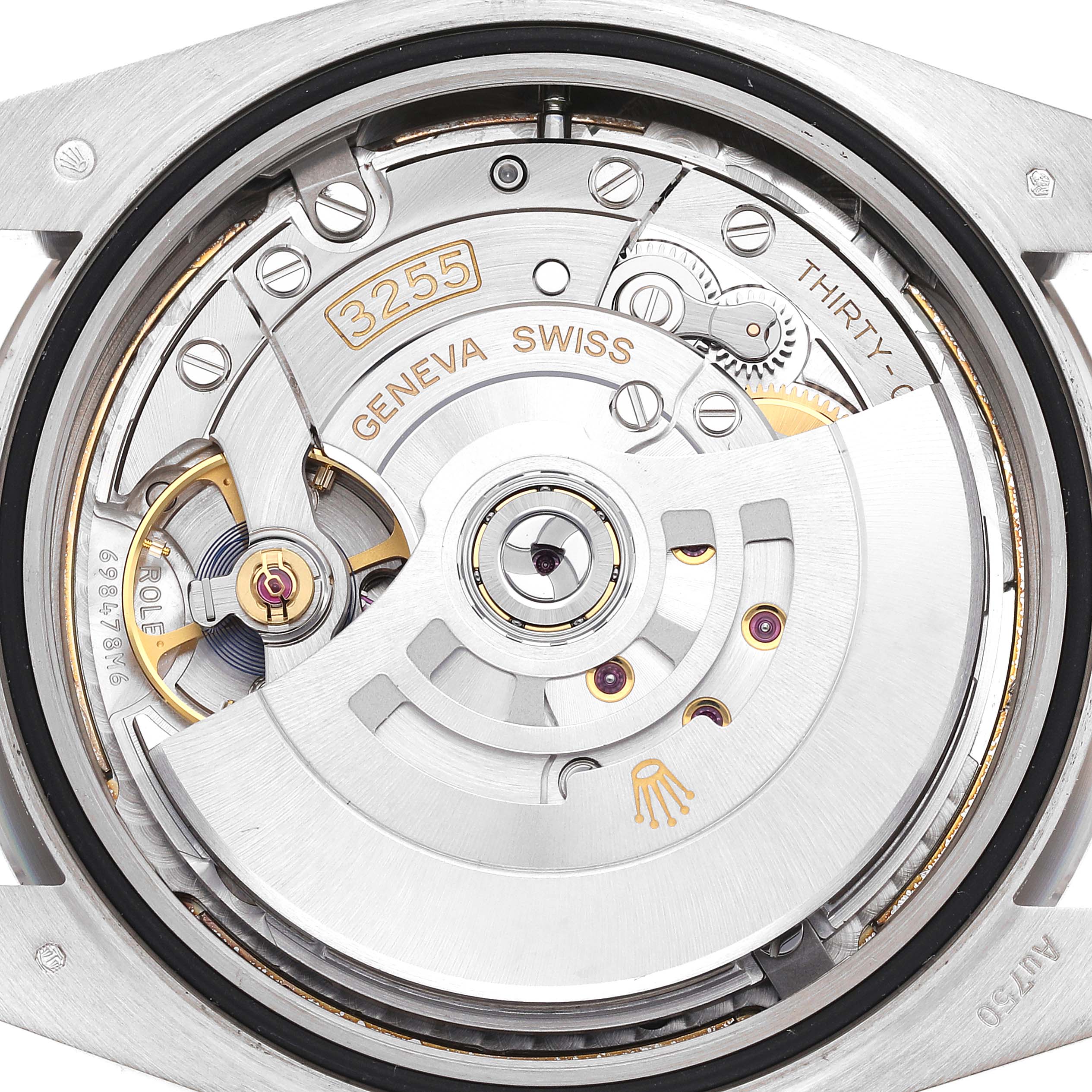 This image shows the intricate inner mechanism of a Rolex President 228239 Men's White Gold Silver Dial 228239 Men's White Gold Silver Dial model watch, viewed from the back.