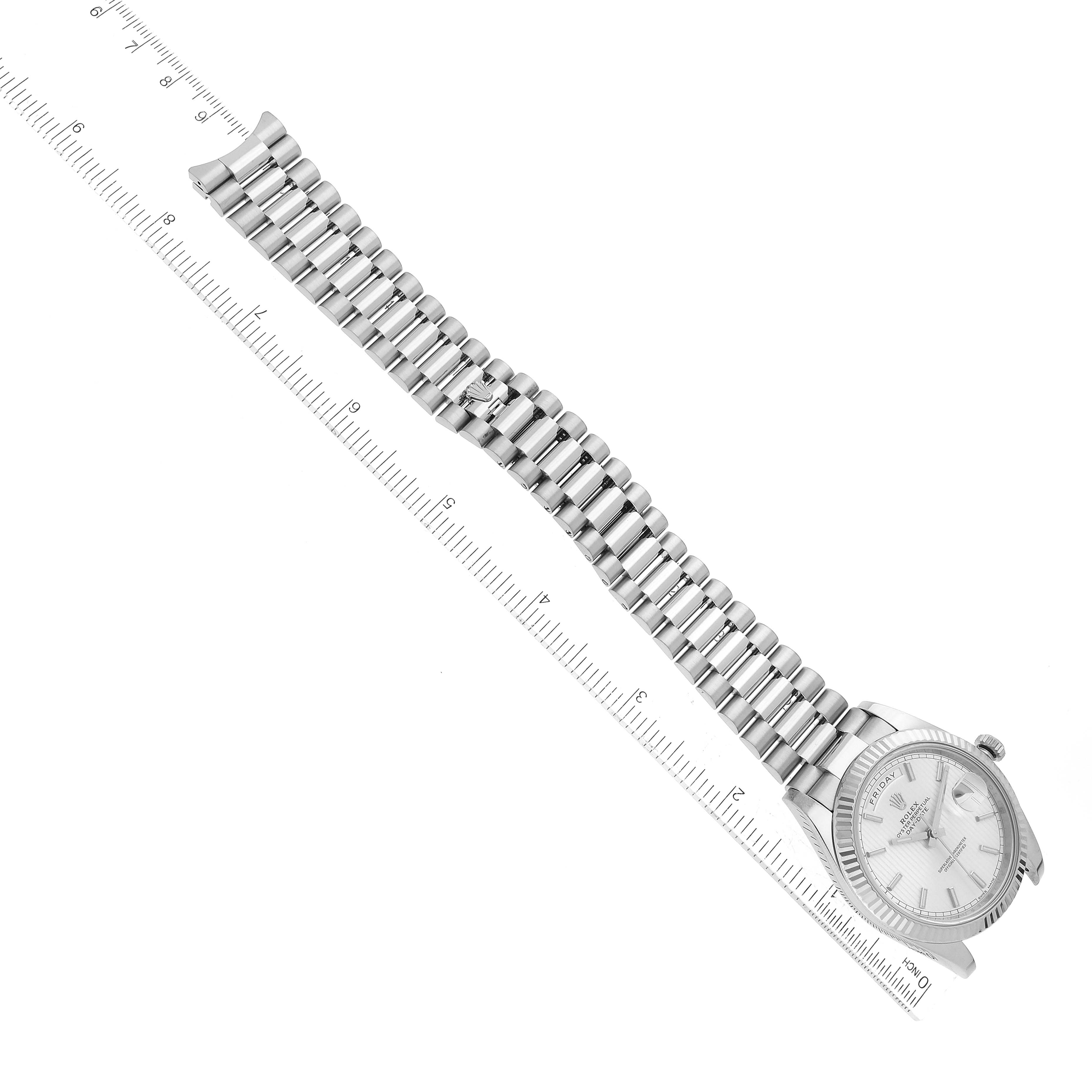 The image shows an overhead view of the Rolex President 228239 Men's White Gold Silver Dial 228239 Men's White Gold Silver Dial watch with the entire band and the face visible.