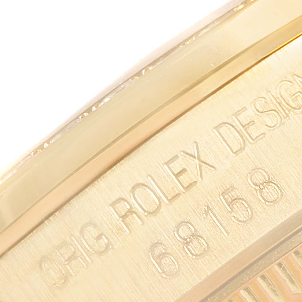 This image shows a close-up of the engraved case back of a Rolex President 68158 Women's Yellow Gold Grey Dial 68158 Women's Yellow Gold Grey Dial model with model number 68158.