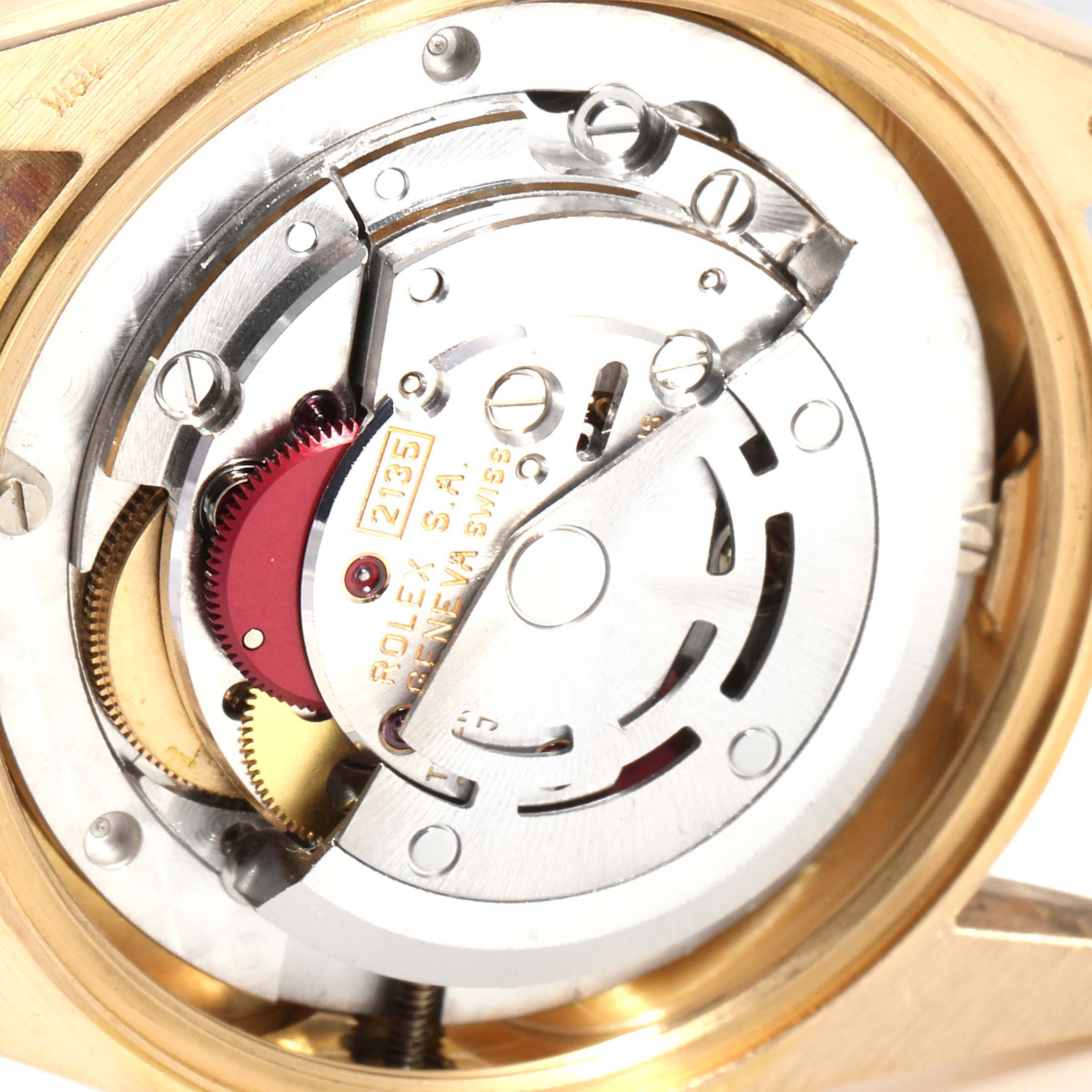 The image shows the internal mechanical movement of a Rolex President 68158 Women's Yellow Gold Grey Dial 68158 Women's Yellow Gold Grey Dial model watch from a close-up rear view angle.