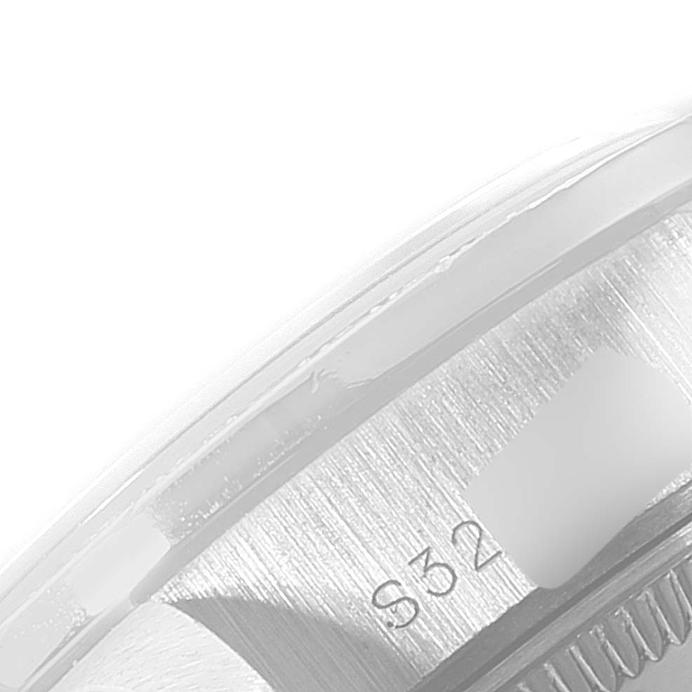 This image shows a close-up of the case edge and part of the bezel of a Rolex President 69136 Women's Platinum Silver Dial 69136 Women's Platinum Silver Dial model watch.