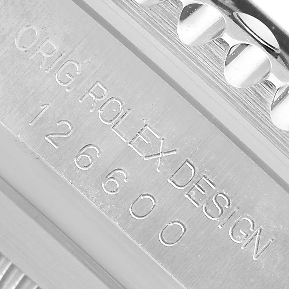 The image shows a close-up of the side of a Rolex Sea-Dweller 126600 Men's Stainless Steel Black Dial, focusing on the engraved model number 126600 and part of the bezel.