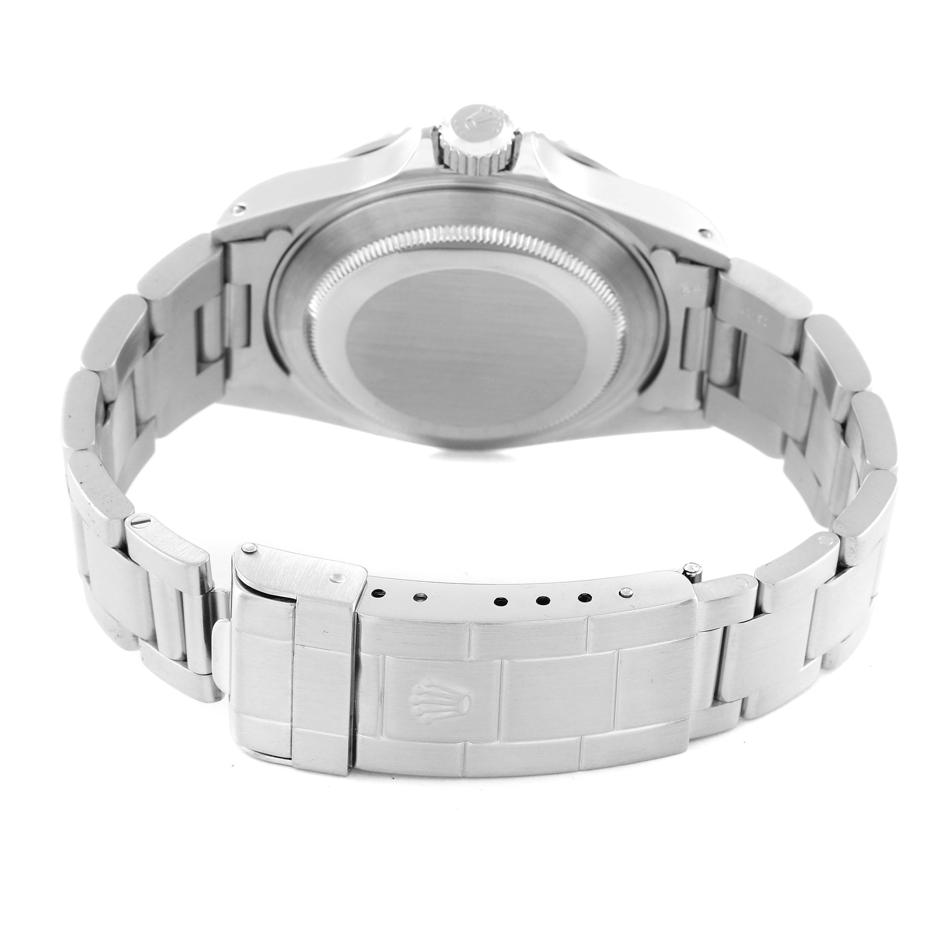 The image shows the back view of a Rolex Submariner 14060 Men's Stainless Steel Black Dial 14060 Men's Stainless Steel Black Dial watch, highlighting its case back, bracelet, and clasp.