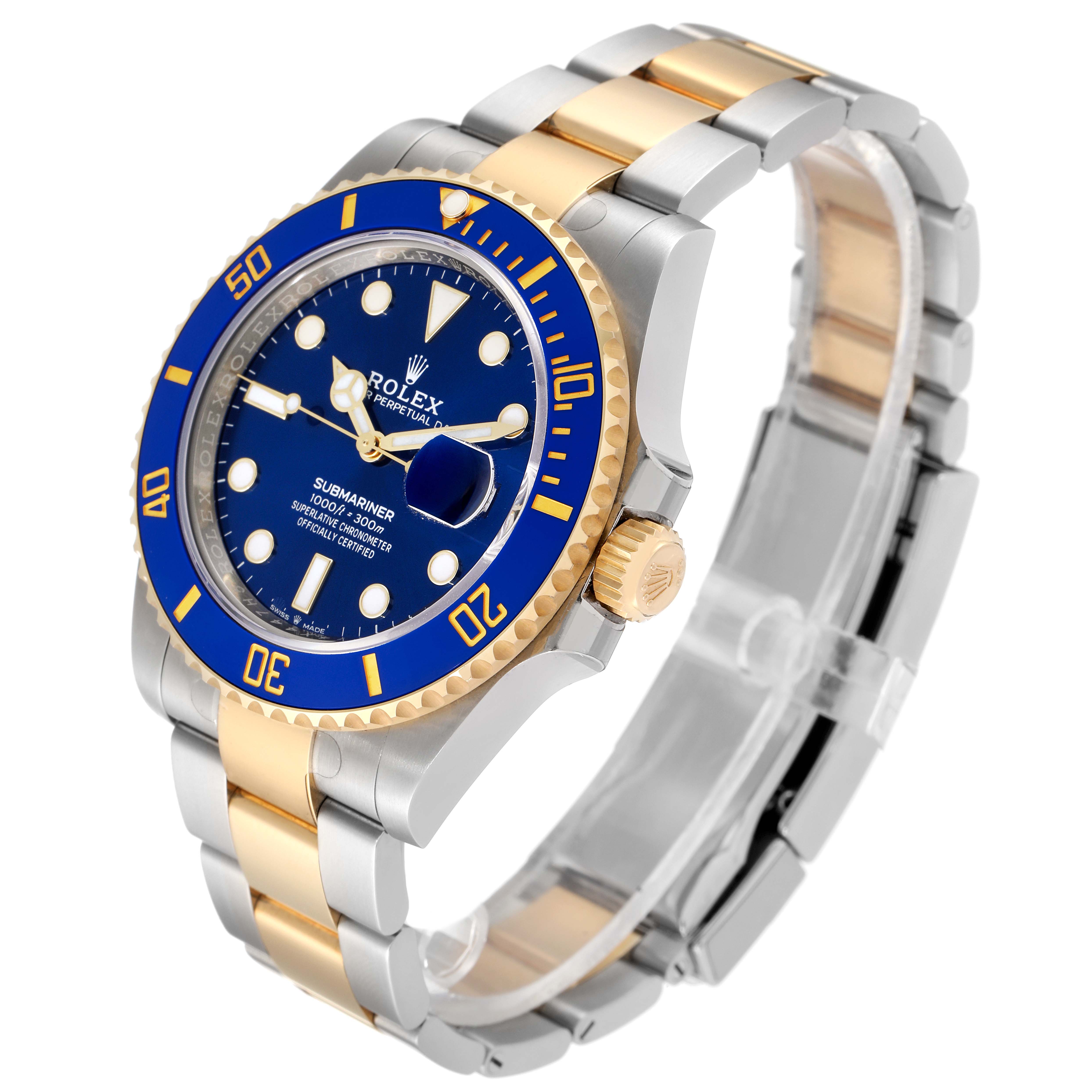The image shows a Rolex Submariner 126613 Men
s Steel and Gold (two tone) Blue Dial 126613 Men
s Steel and Gold (two tone) Blue Dial watch at an angled view, highlighting its blue dial, gold bezel, and two-tone metal band.