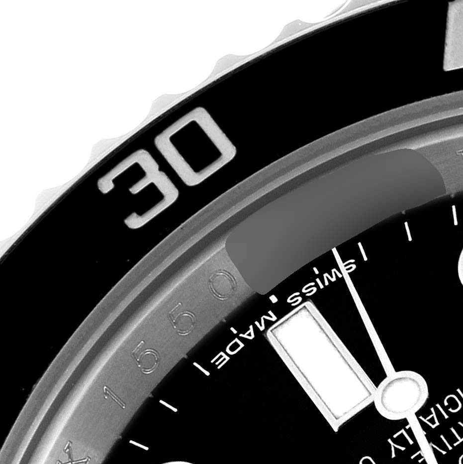 This image shows a close-up of the dial and bezel of a Rolex Submariner 116610 Men's Stainless Steel Black Dial 116610 Men's Stainless Steel Black Dial watch, focusing on the "30" minute marker.