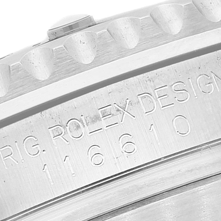 The image shows a close-up of the case edge with etching details of a Rolex Submariner 116610 Men's Stainless Steel Black Dial 116610 Men's Stainless Steel Black Dial watch, model number 116610.