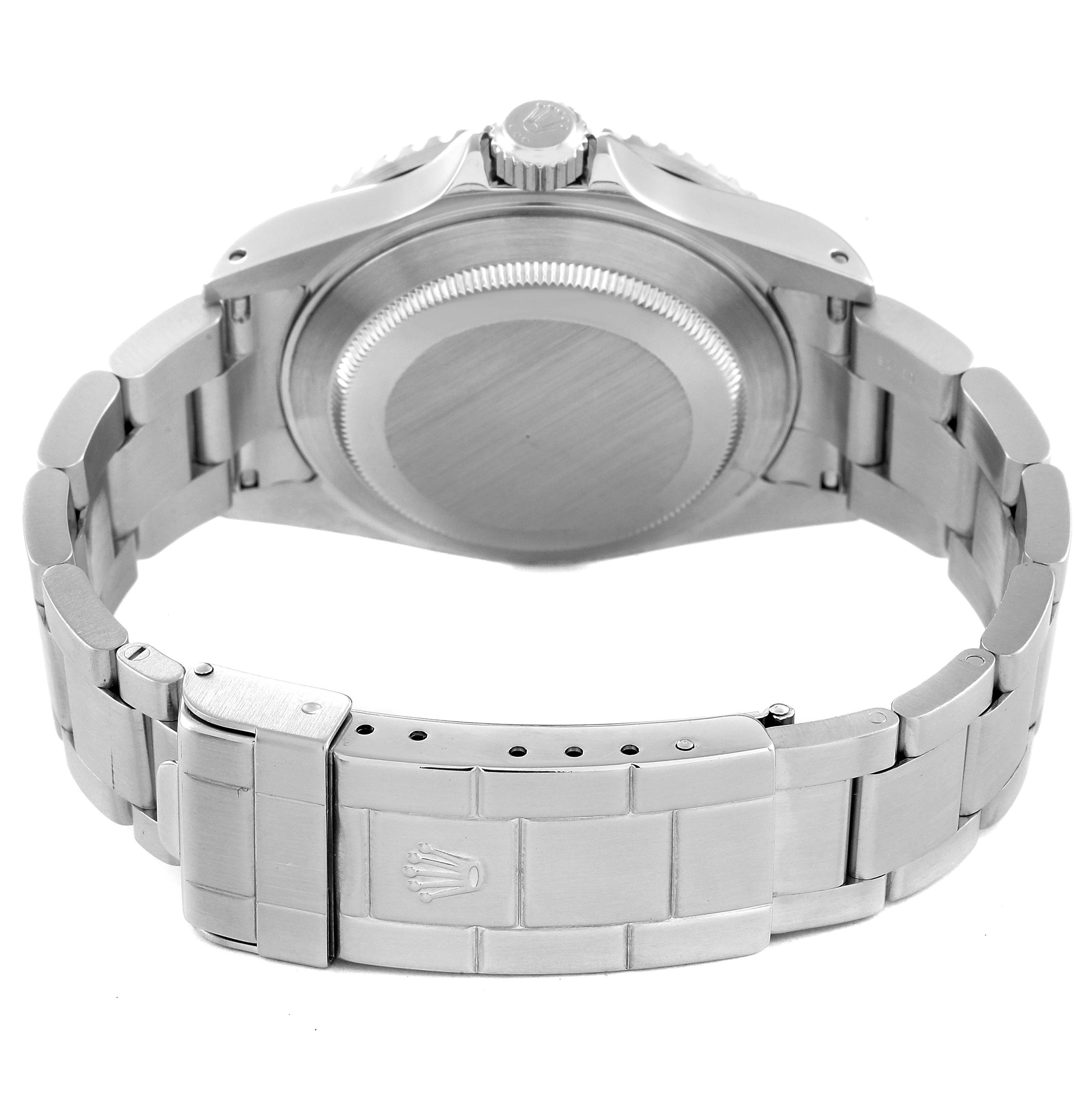 The image shows the case back and bracelet clasp of a Rolex Submariner 16610 Men
s Stainless Steel Black Dial 16610 Men
s Stainless Steel Black Dial watch from the rear angle.