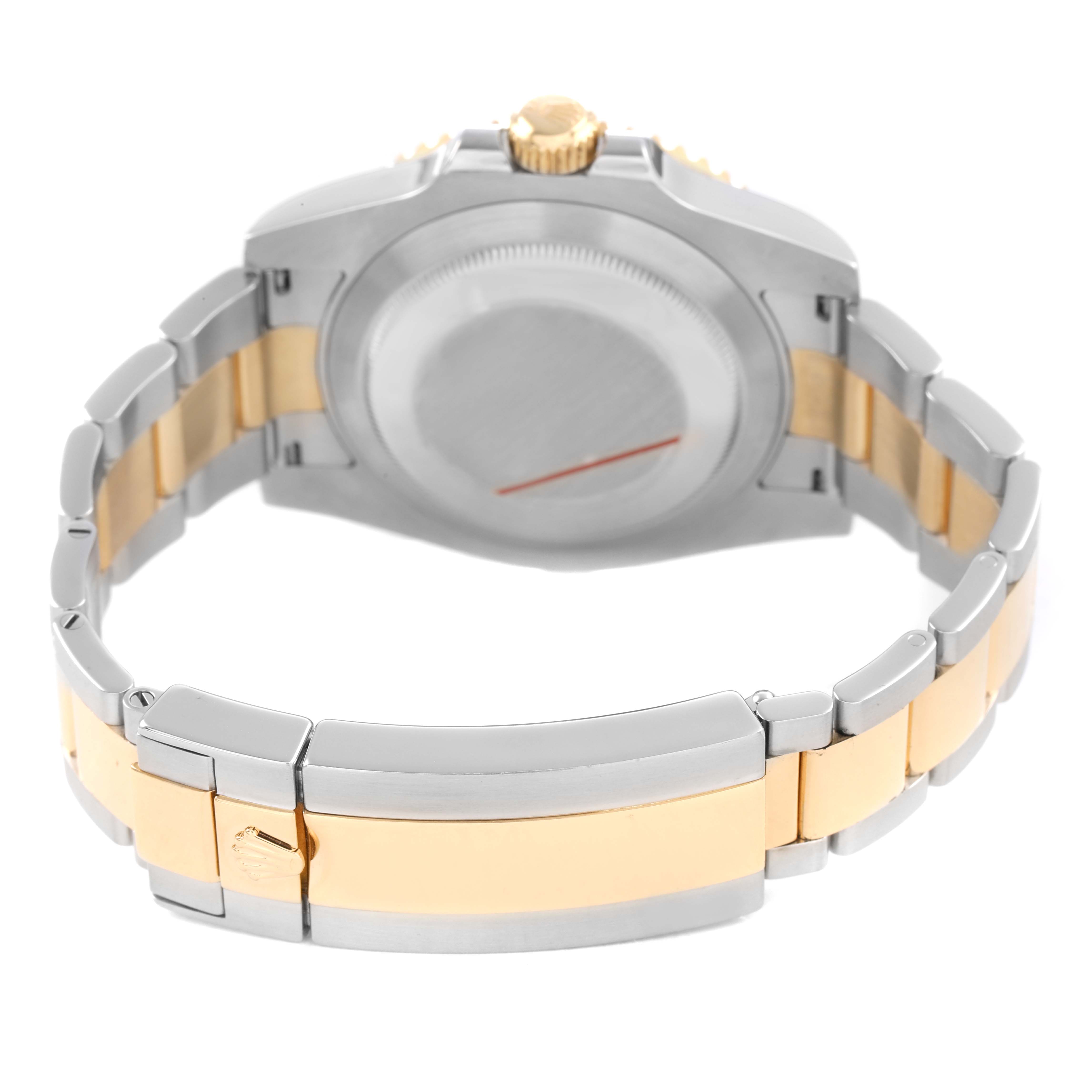 The image shows the case back, crown, and bracelet of a Rolex Submariner 116613 Men's Steel and Gold (two tone) Black Dial, viewed from the rear angle.