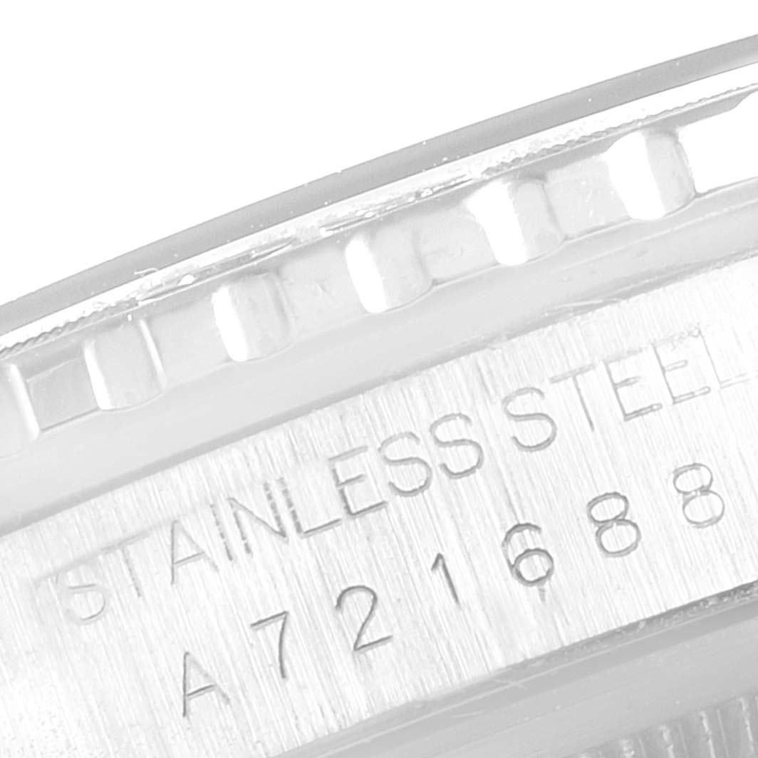 The image shows a close-up of the stainless steel bezel and case with engraving on the Rolex Turn-o-Graph 16264 Men's Stainless Steel Black Dial 16264 Men's Stainless Steel Black Dial watch.