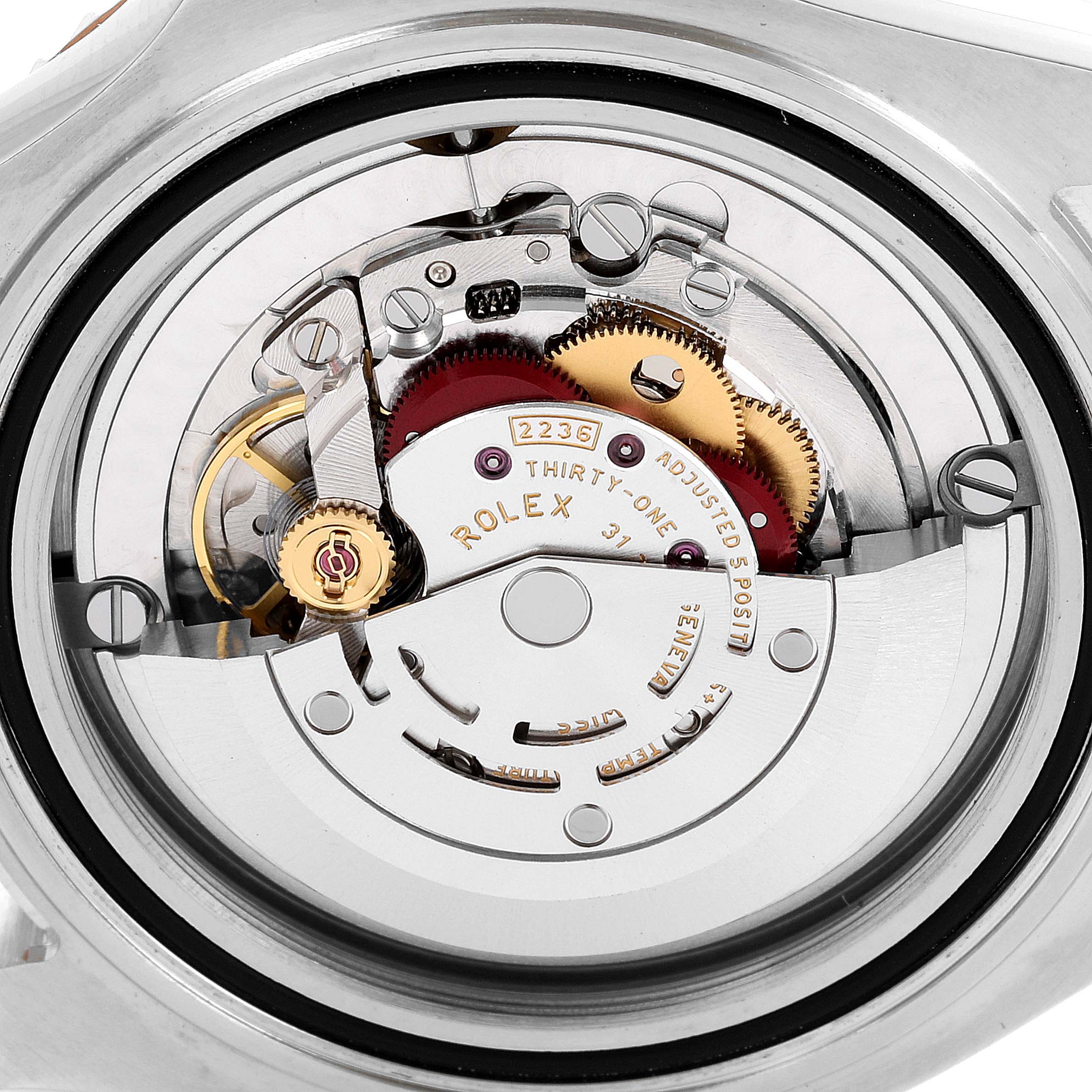 This image shows a close-up of the inner mechanical movement of the Rolex Yacht-Master 268621 Men's Steel and Gold (two tone) Brown Dial 268621 Men's Steel and Gold (two tone) Brown Dial watch.