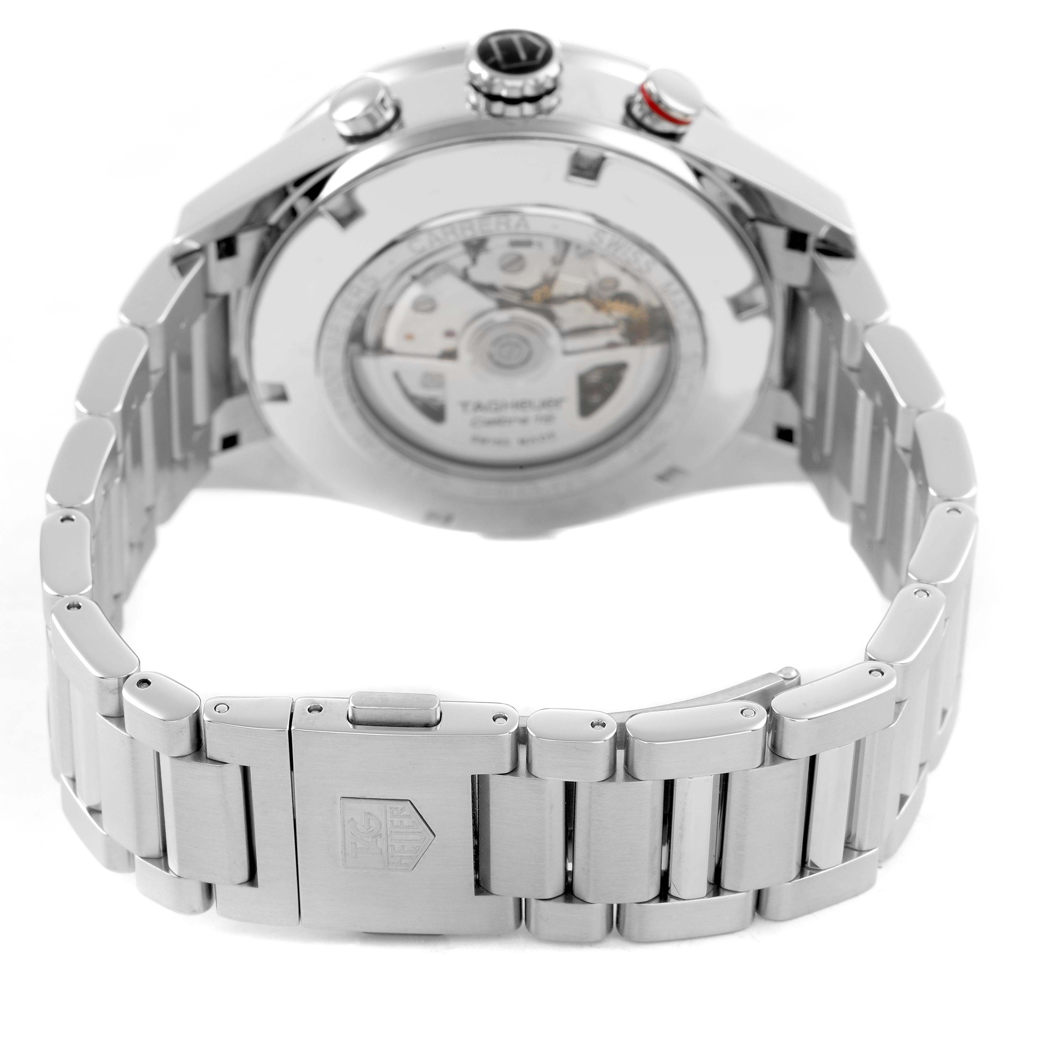 The Tag Heuer Carrera CV2A1R Men's Stainless Steel Black Dial watch is shown from the back, highlighting the open case back and metal bracelet clasp.