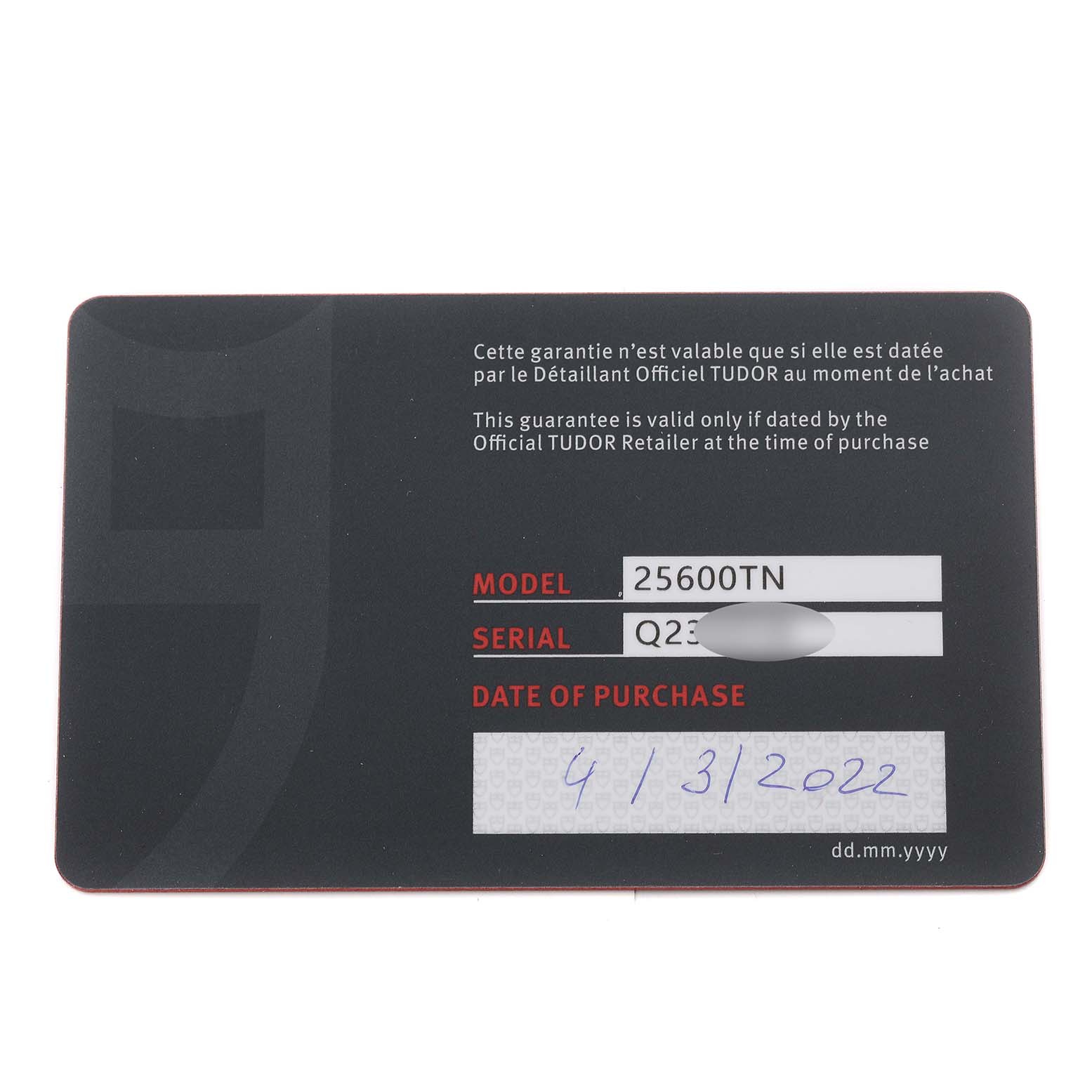 The image shows the warranty card for a Tudor Pelagos M25600TN-0001 Men's Titanium Black Dial M25600TN-0001 Men's Titanium Black Dial model 25600TN watch, noting the serial number and date of purchase.