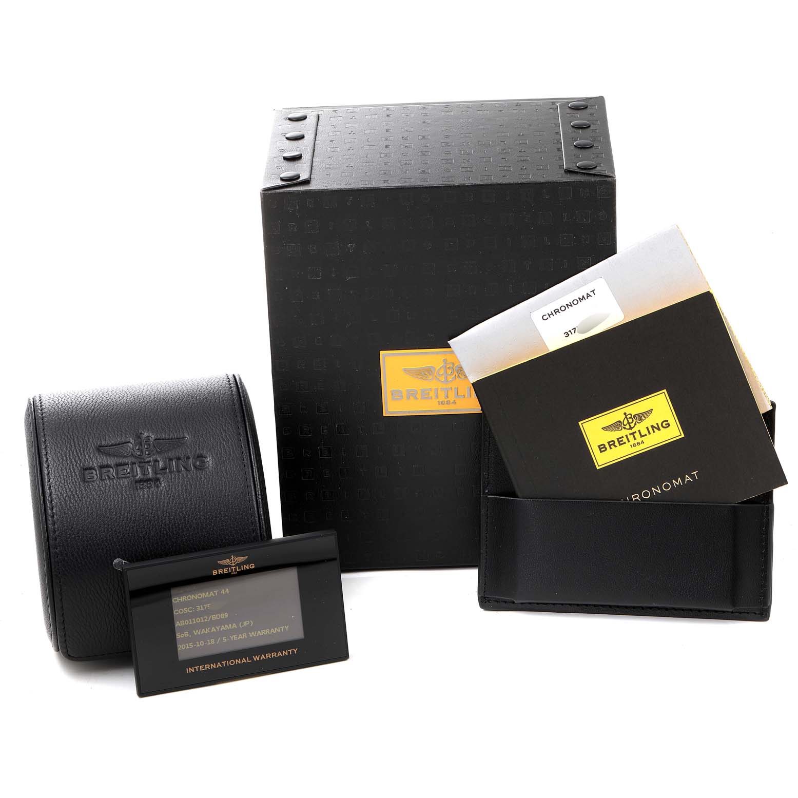 The image shows the box, warranty card, and manuals for the Breitling Chronomat AB0110 Men
s Stainless Steel Black Dial AB0110 Men
s Stainless Steel Black Dial model.