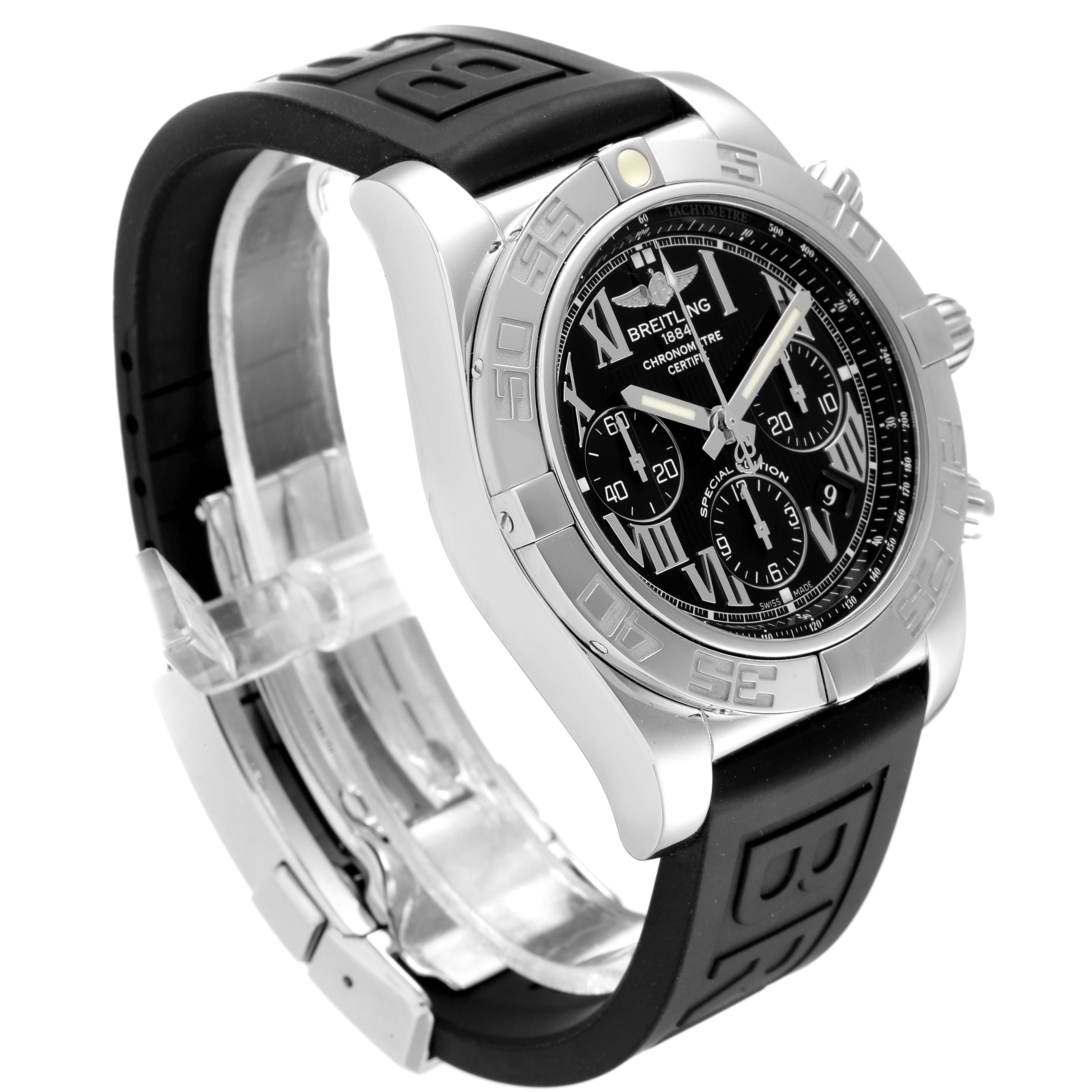 The image shows the Breitling Chronomat AB0110 Men
s Stainless Steel Black Dial AB0110 Men
s Stainless Steel Black Dial watch from an angled side view, highlighting its bezel, dial, and rubber strap.