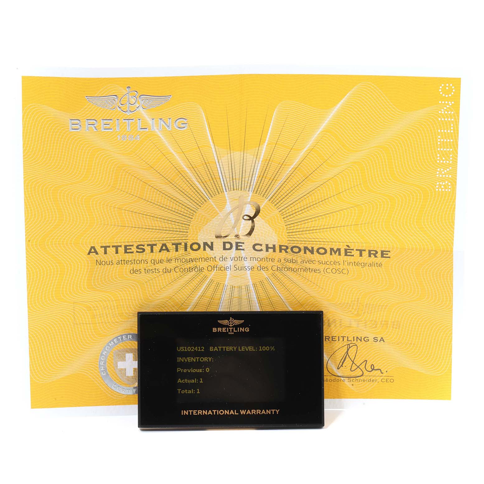 The image shows a Breitling Superocean M17393 Men's Stainless Steel Black Dial M17393 Men's Stainless Steel Black Dial model's certification and international warranty card, both laid flat.