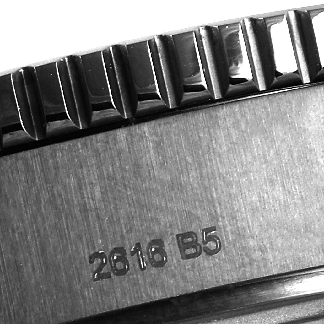 This image shows a close-up of the bezel and casing with part number details on a Breitling Superocean M17393 Men's Stainless Steel Black Dial M17393 Men's Stainless Steel Black Dial watch.