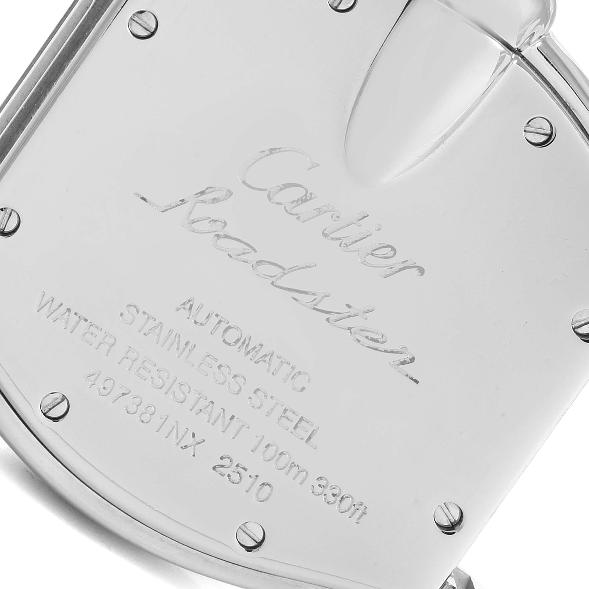 The image shows the back case of a Cartier Roadster W62025V3 Men's Stainless Steel Silver Dial W62025V3 Men's Stainless Steel Silver Dial watch, highlighting its engraving and screws.