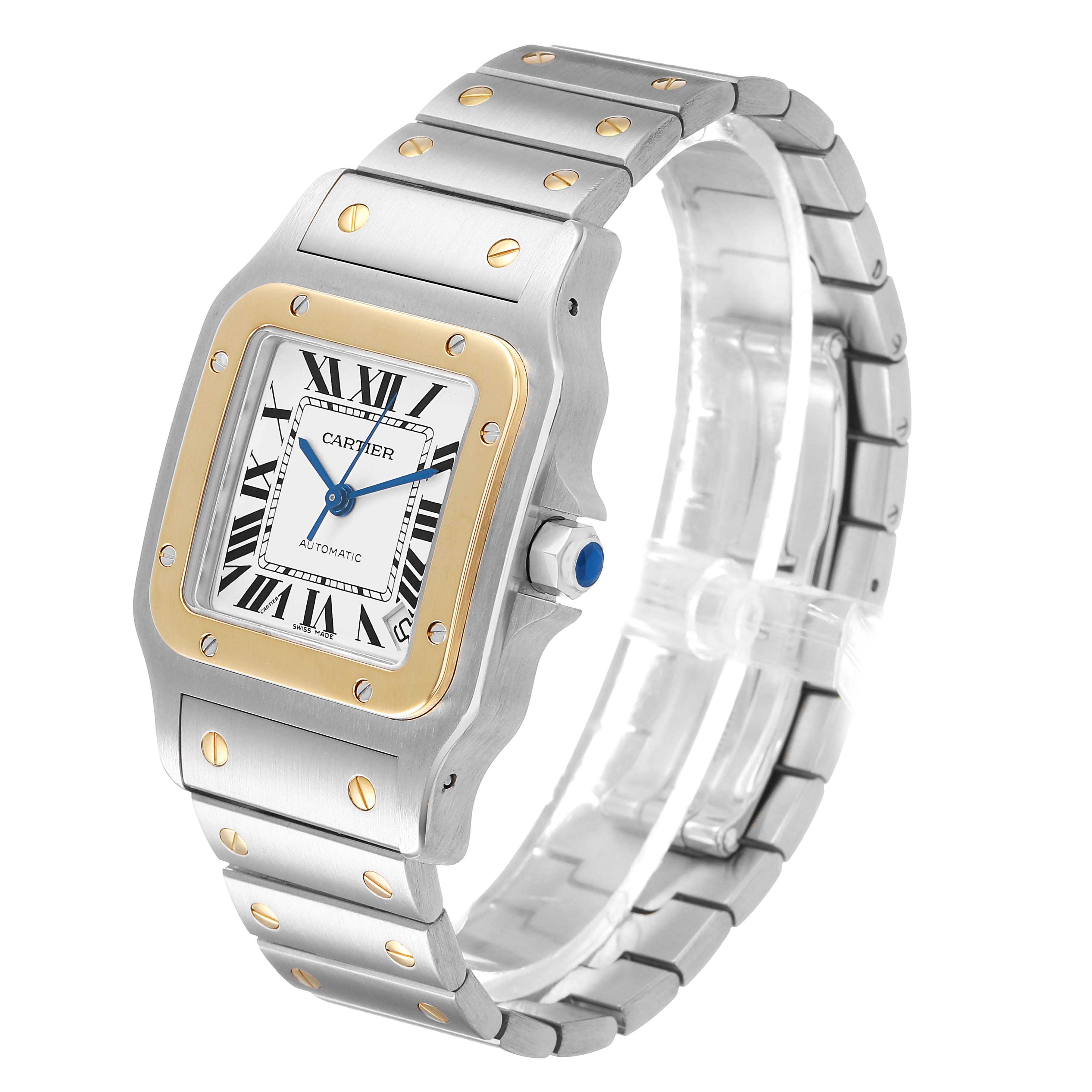 The Cartier Santos W20099C4 Men's Steel and Gold (two tone) Silver Dial watch is shown at a slight angle, highlighting its square face, gold bezel, and metal bracelet with visible screws.