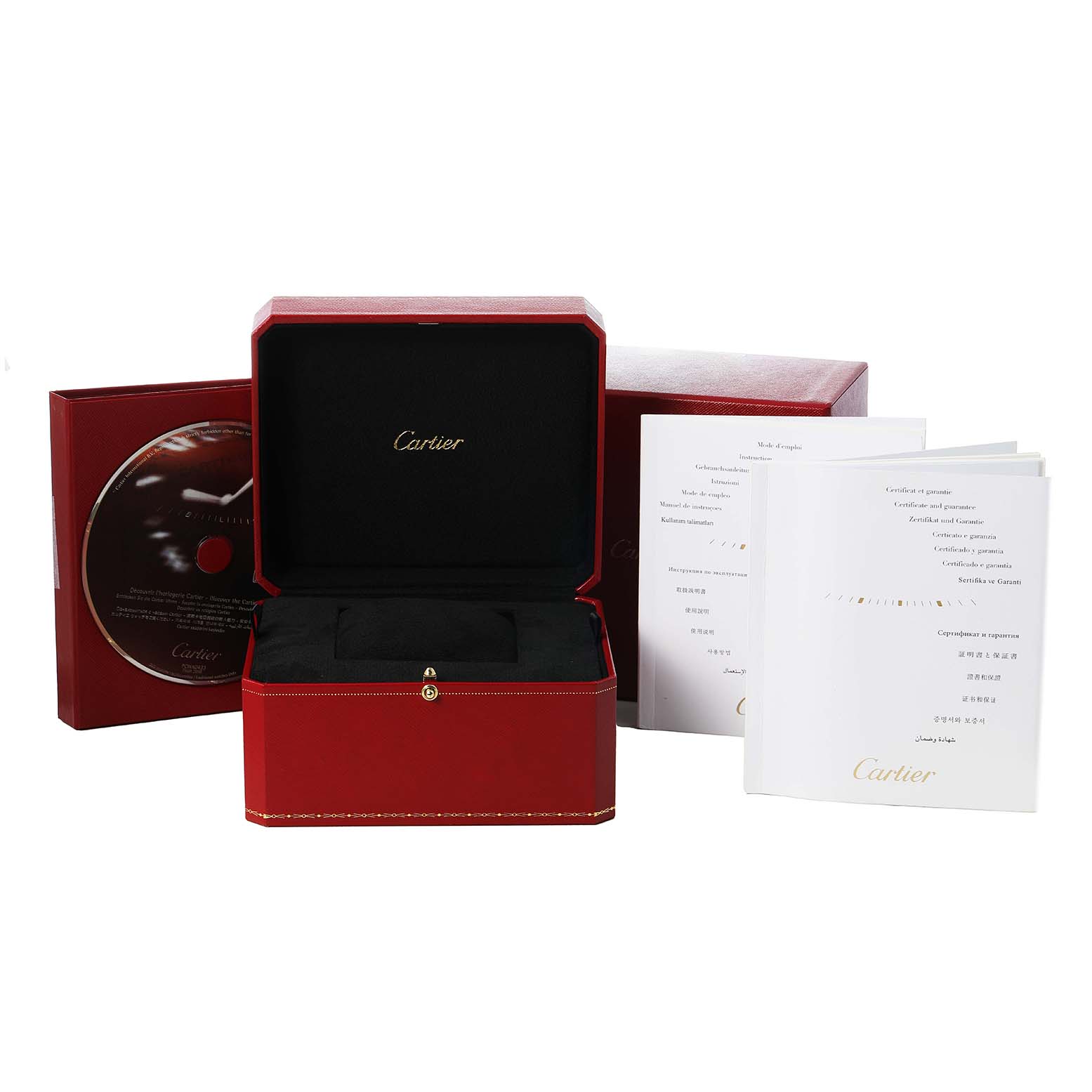 The image shows a red Cartier watch box, likely for a Santos model, along with manuals and a CD.
