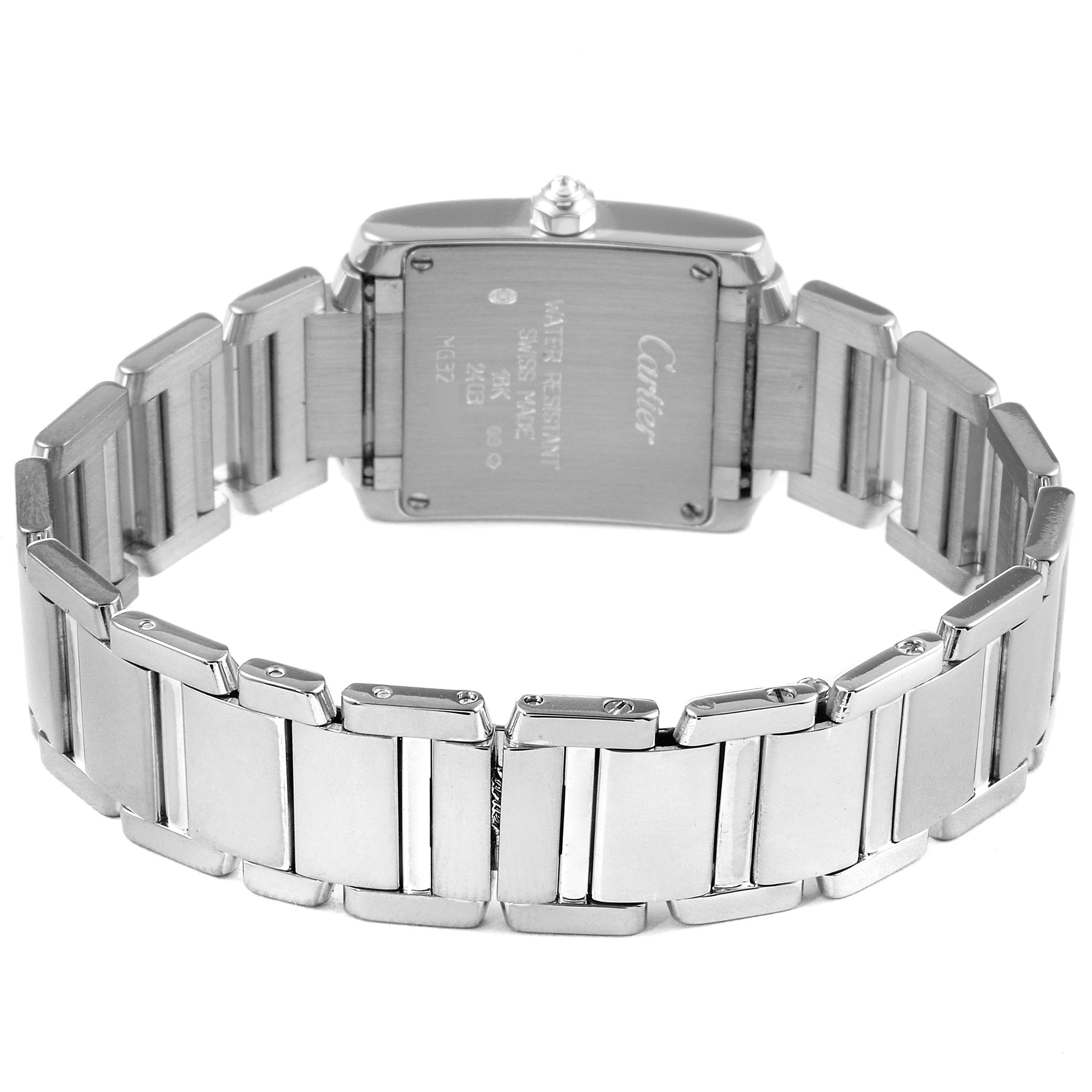 This image shows the back view of the Cartier Tank Française watch, highlighting the stainless steel bracelet and case back.