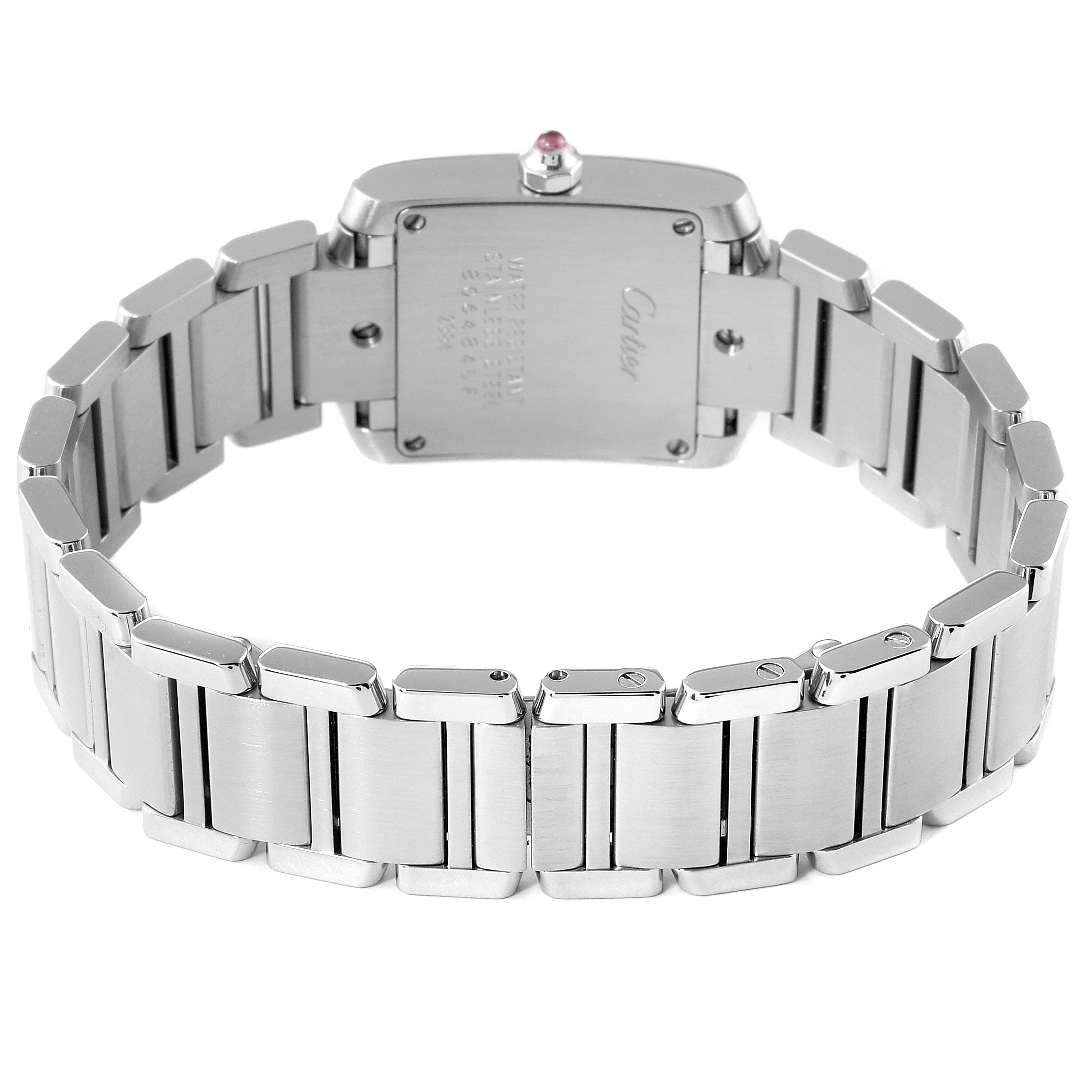 The image shows the back view of the Cartier Tank Française watch, highlighting its stainless steel bracelet and case back.