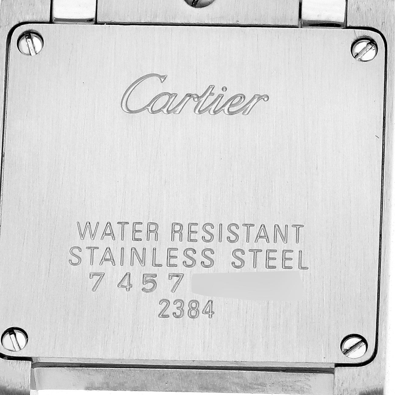 The image shows the back case of a Cartier Tank Française watch, displaying the brand logo and model details.