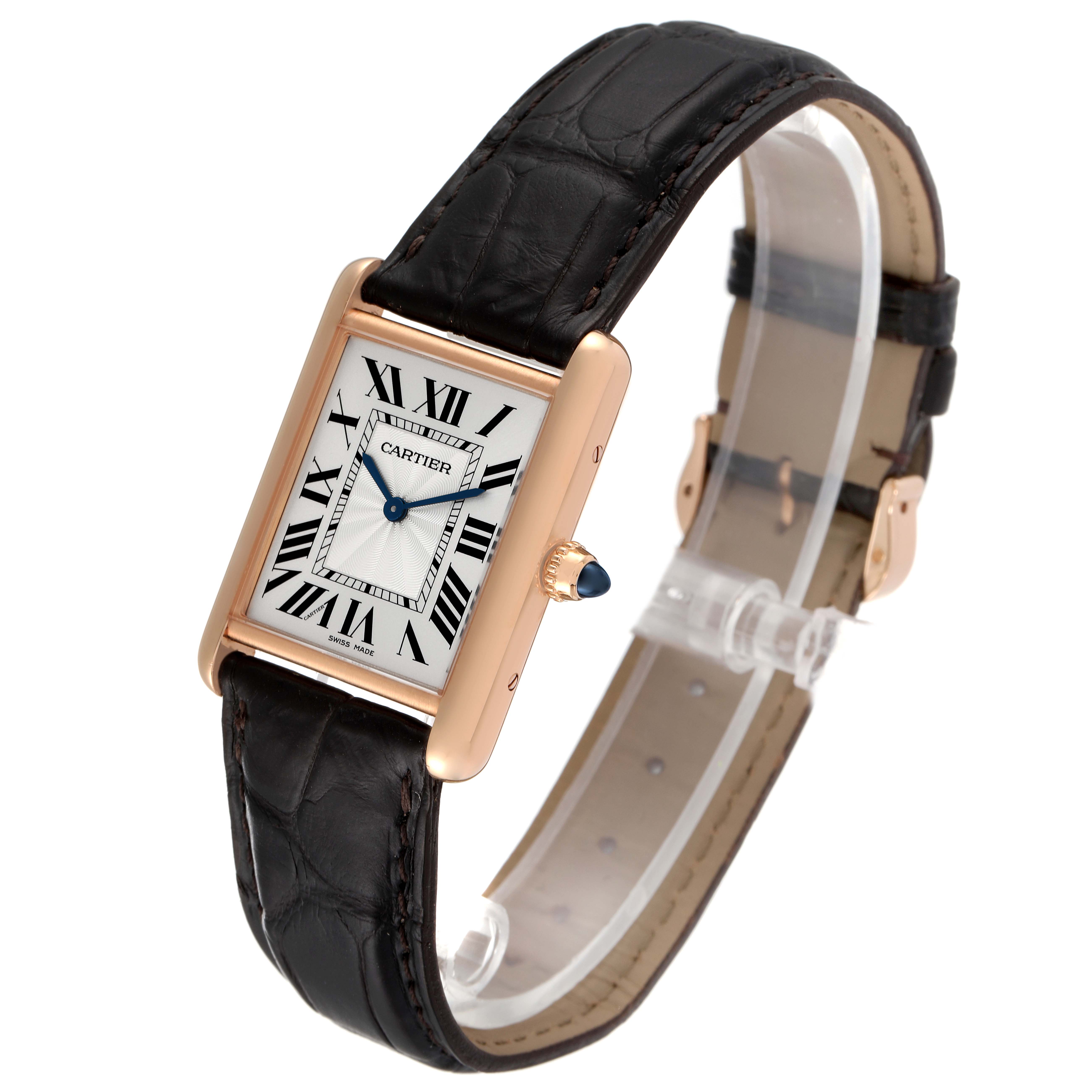 The image shows a Cartier Tank Louis WGTA0011 Men's Rose Gold Silver Dial WGTA0011 Men's Rose Gold Silver Dial watch angled from the front, highlighting the face, strap, and side crown with a blue gemstone.
