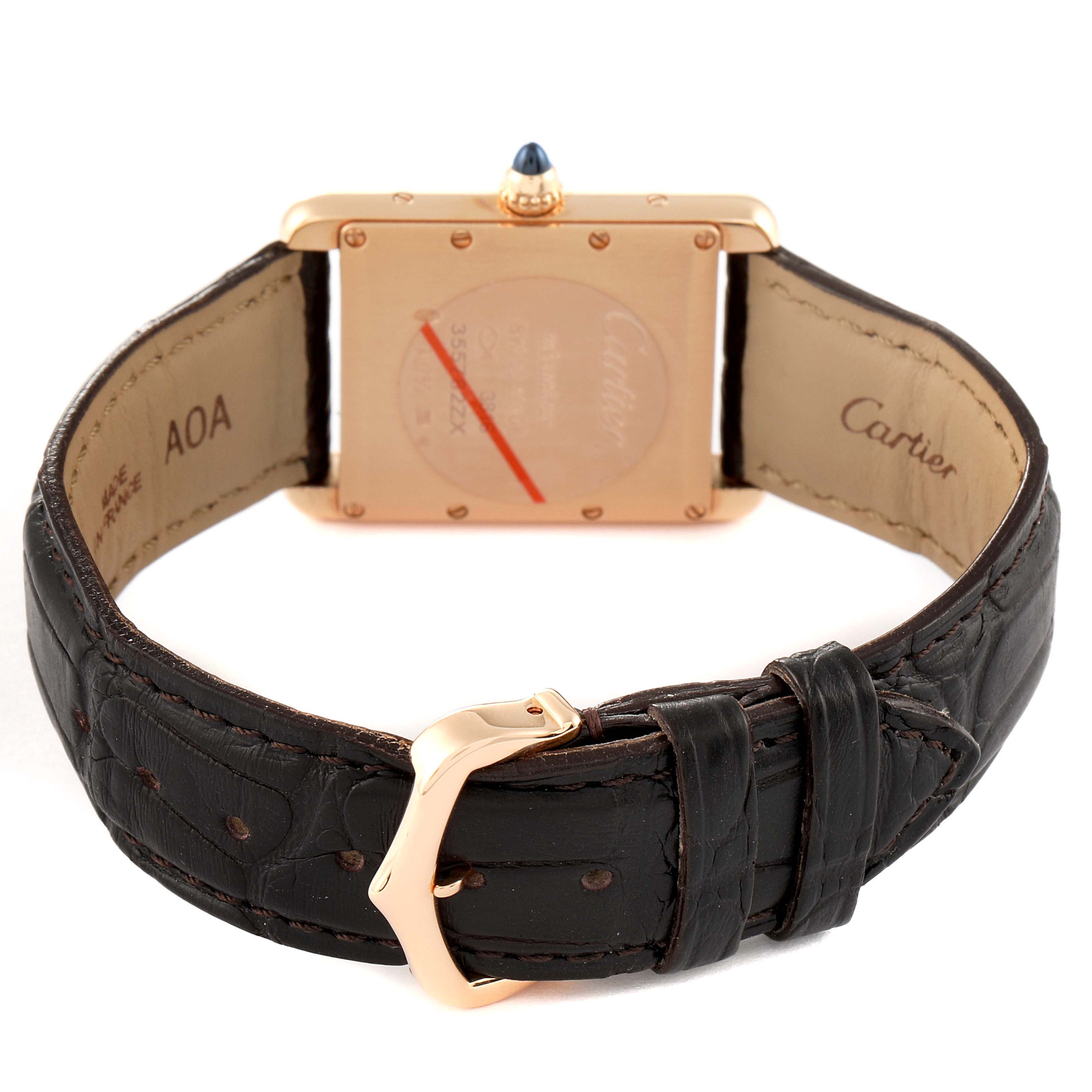 The image shows the back view of a Cartier Tank Louis WGTA0011 Men's Rose Gold Silver Dial WGTA0011 Men's Rose Gold Silver Dial watch, highlighting the leather strap and gold buckle.