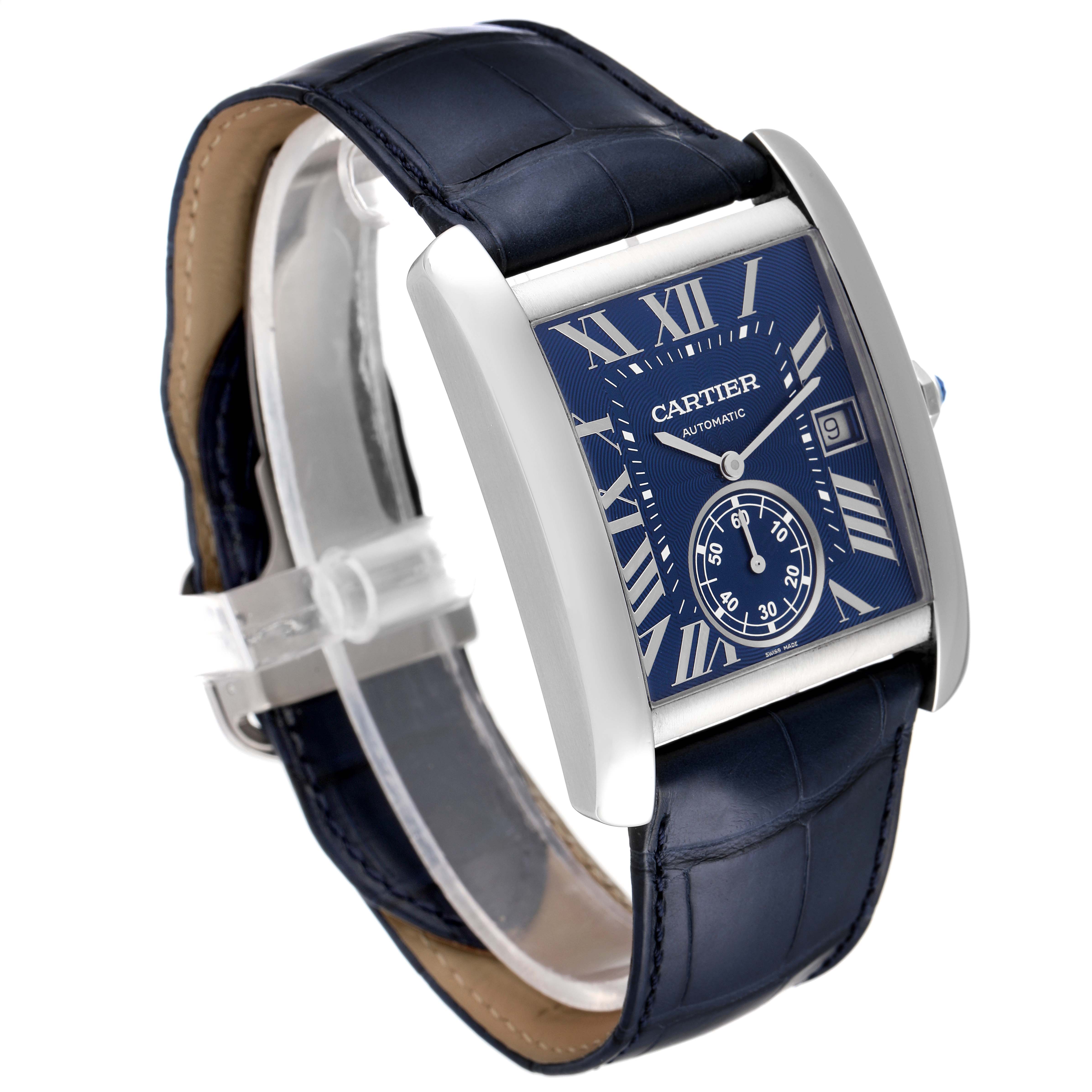 The image shows a Cartier Tank MC WSTA0010 Men
s Stainless Steel Blue Dial WSTA0010 Men
s Stainless Steel Blue Dial watch at a three-quarter angle, featuring the face, bezel, crown, and part of the leather strap.
