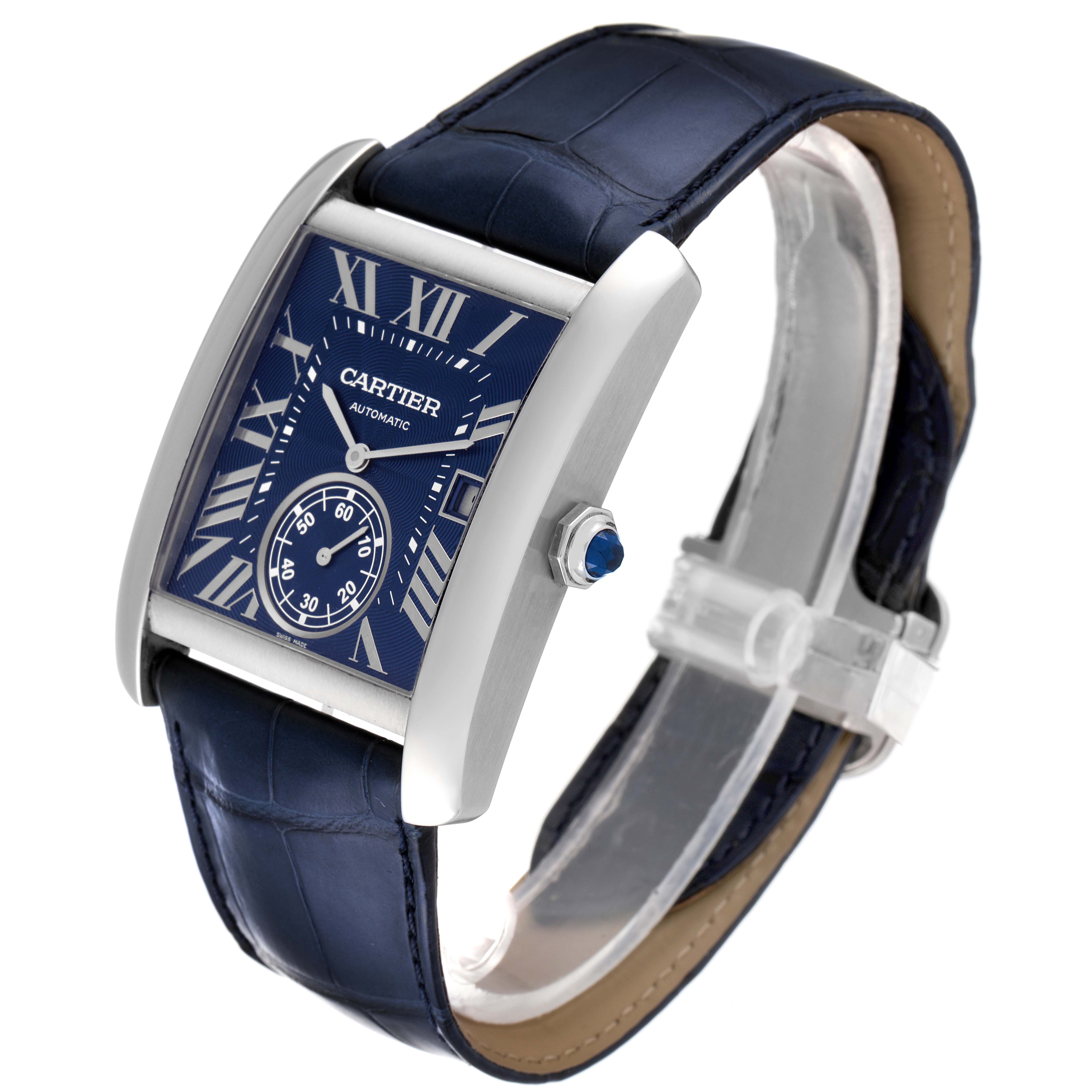 The Tank MC by Cartier is shown at a slight angle, displaying its blue dial, Roman numerals, subdial, and blue leather strap.