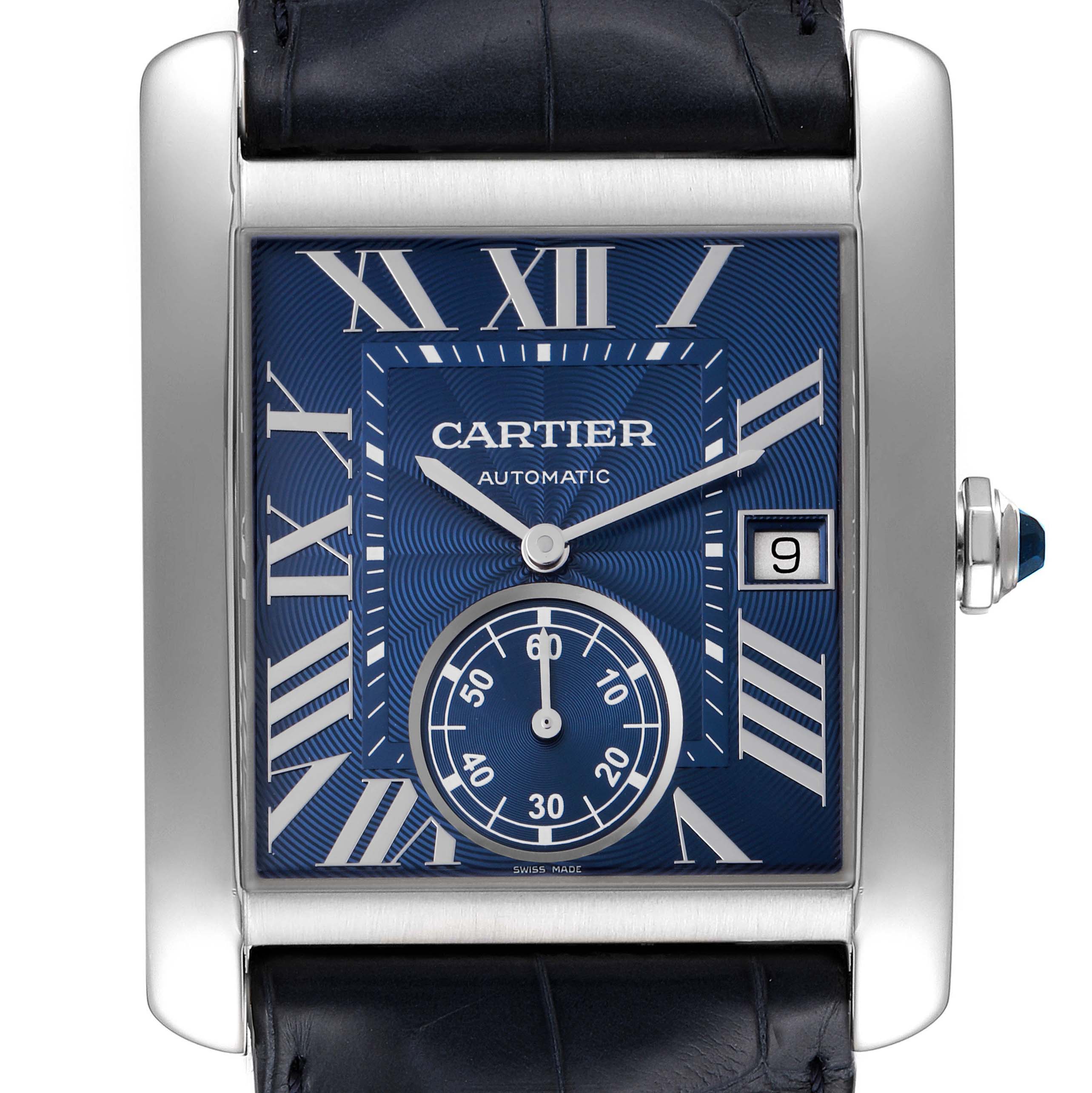 The Cartier Tank MC WSTA0010 Men
s Stainless Steel Blue Dial WSTA0010 Men
s Stainless Steel Blue Dial watch is shown from a front angle, displaying its blue dial, Roman numerals, and date window.