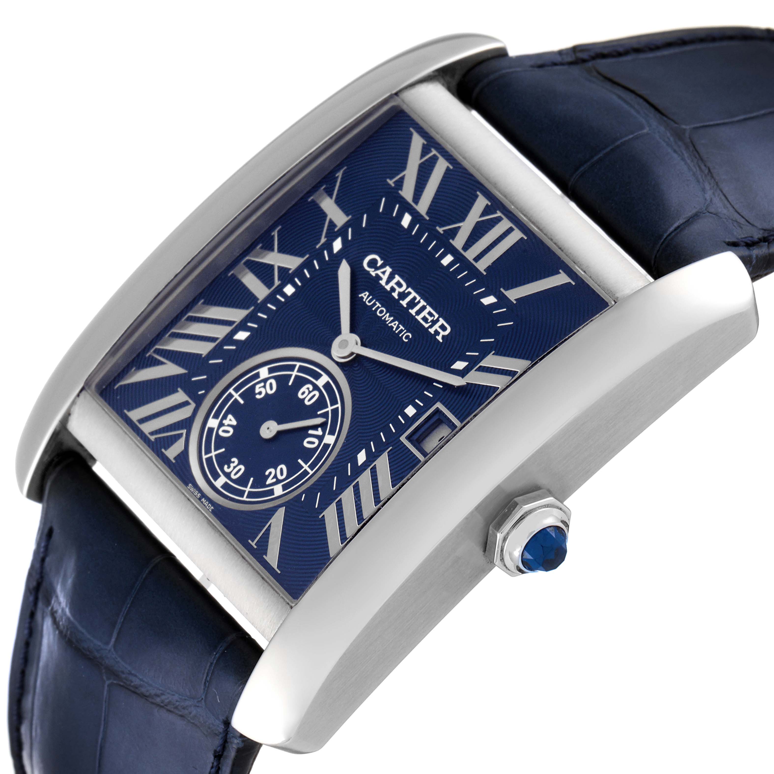 The image shows a close-up angled view of the Cartier Tank MC WSTA0010 Men
s Stainless Steel Blue Dial WSTA0010 Men
s Stainless Steel Blue Dial watch face and strap, highlighting the crown and dial.