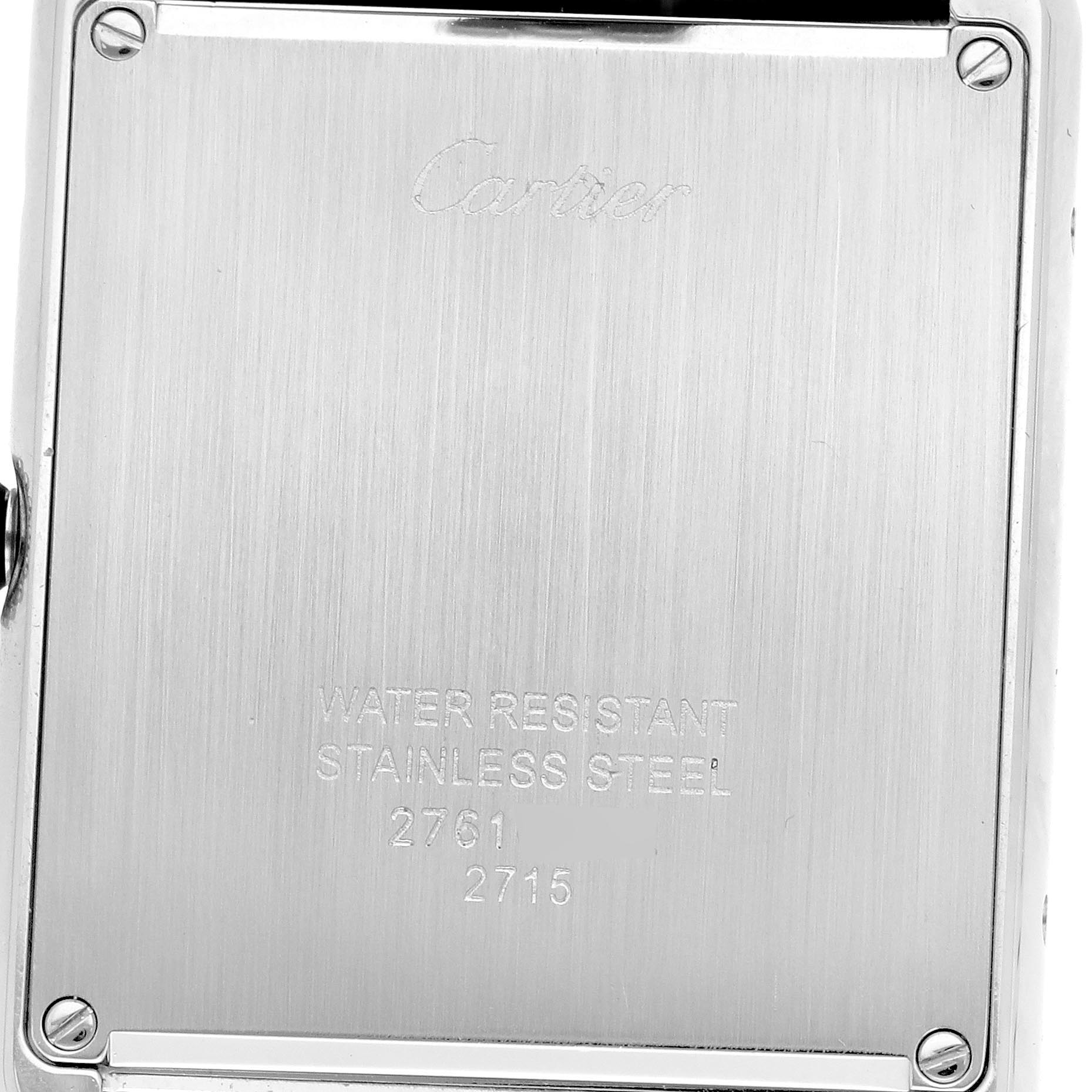 The image shows the back case of a Cartier Tank Solo W1018355 Men
s Stainless Steel Silver Dial W1018355 Men
s Stainless Steel Silver Dial watch, highlighting its stainless steel material and water resistance.
