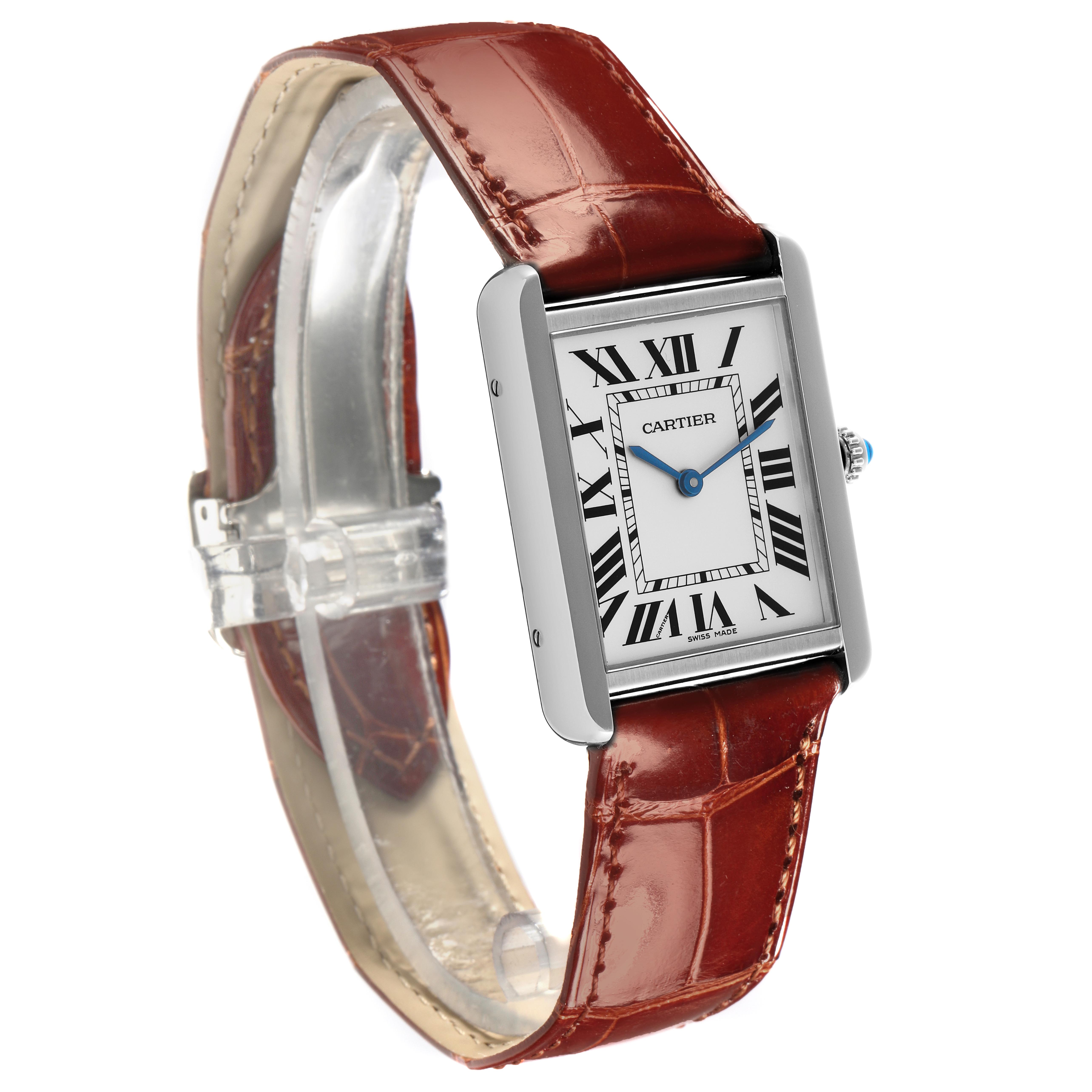 The Cartier Tank Solo W1018355 Men
s Stainless Steel Silver Dial W1018355 Men
s Stainless Steel Silver Dial watch is shown at a 3/4 angle, highlighting the dial, case, and brown leather strap.