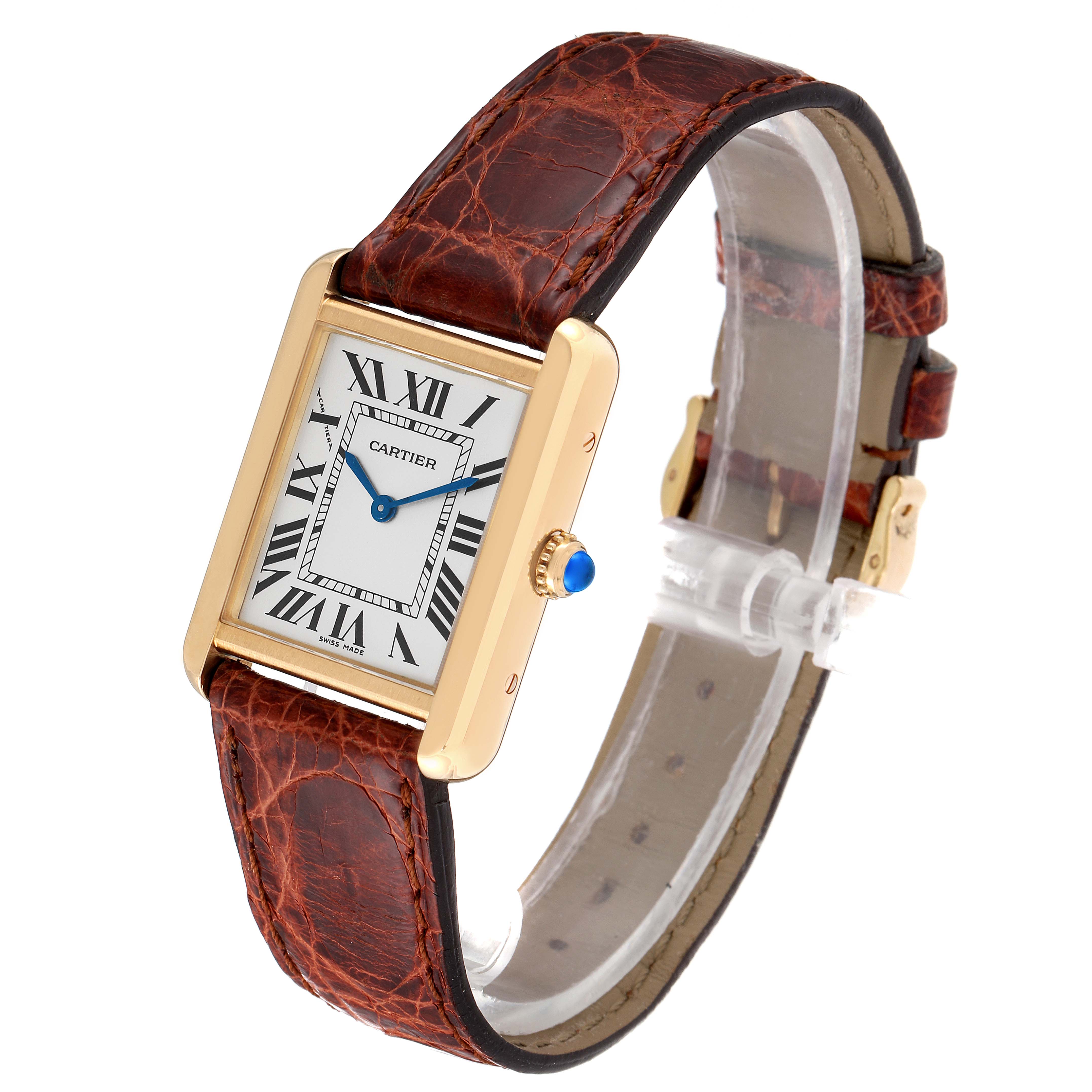 The image shows a Cartier Tank Solo W1018755 Women's Yellow Gold Silver Dial W1018755 Women's Yellow Gold Silver Dial watch at a slight angle, featuring a rectangular face, Roman numerals, and a brown leather strap.
