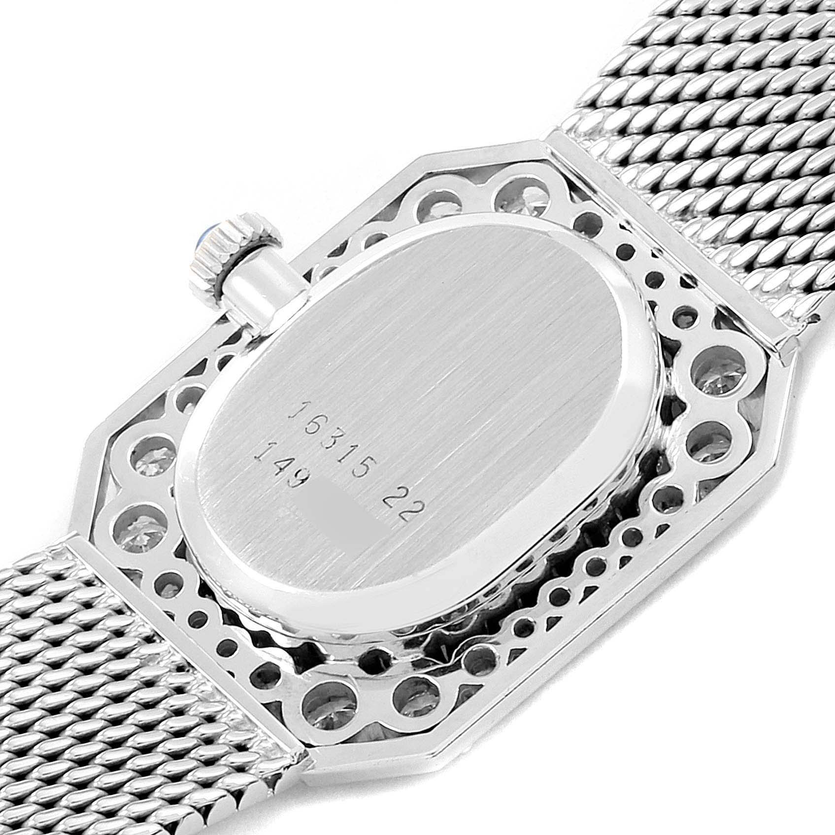 This image shows the back case and mesh band of a vintage Jaeger LeCoultre watch, viewed from a top-down angle.