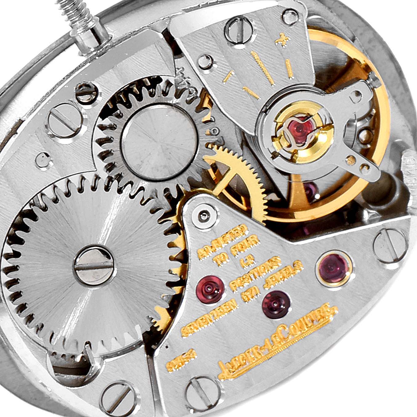 This image shows the intricate inner mechanics of a Vintage Jaeger LeCoultre watch, highlighting gears and the movement components.