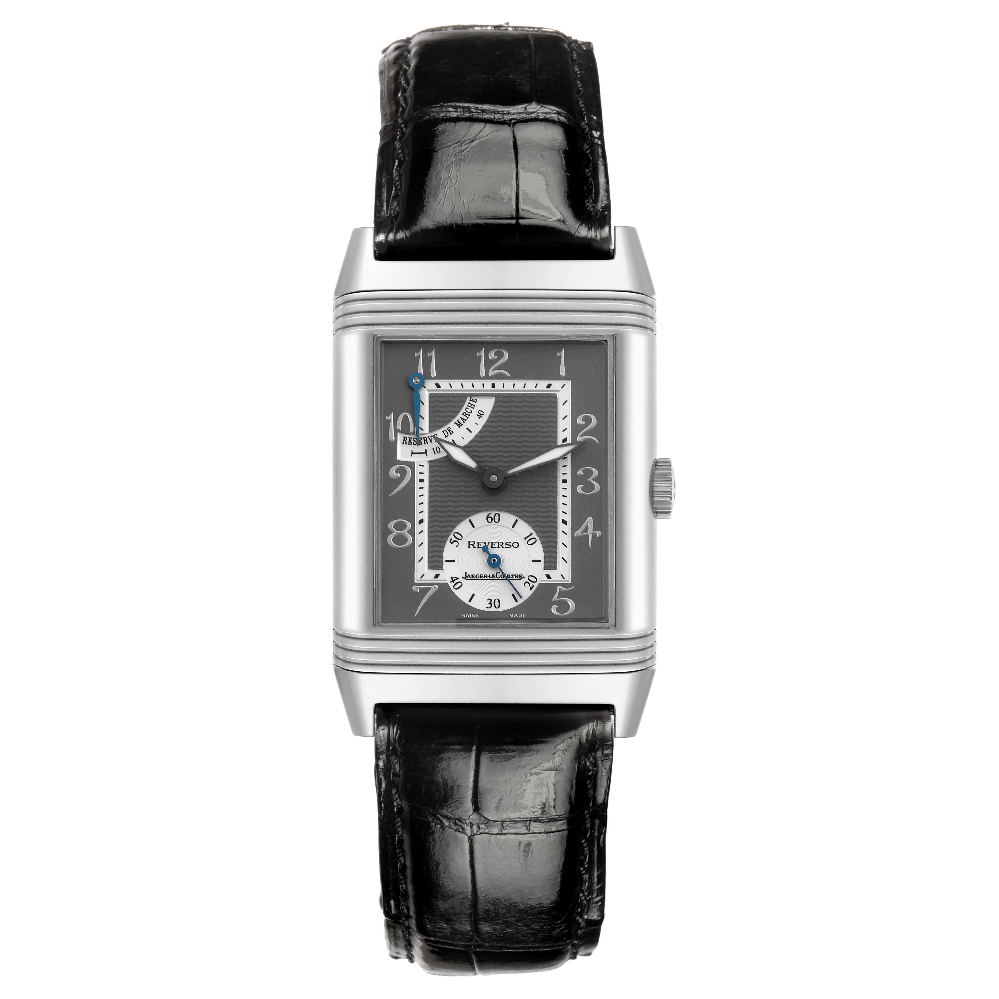 The Jaeger-LeCoultre Reverso watch is shown from a front view, highlighting the rectangular face, crown, and leather strap.
