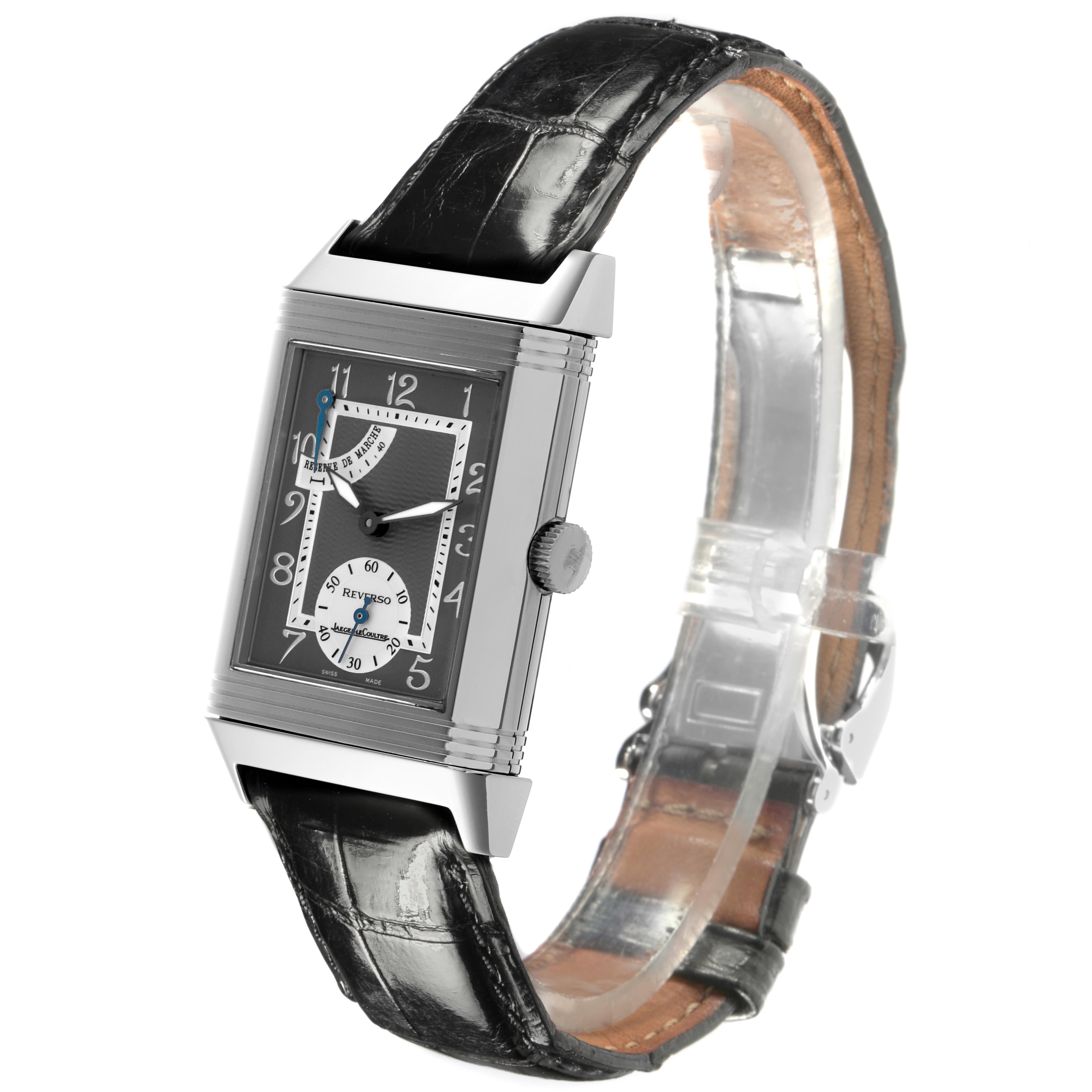 The Jaeger LeCoultre Reverso Q2706440 Men
s Platinum Grey Dial Q2706440 Men
s Platinum Grey Dial is shown at an angle highlighting its rectangular face, crown, and leather strap.