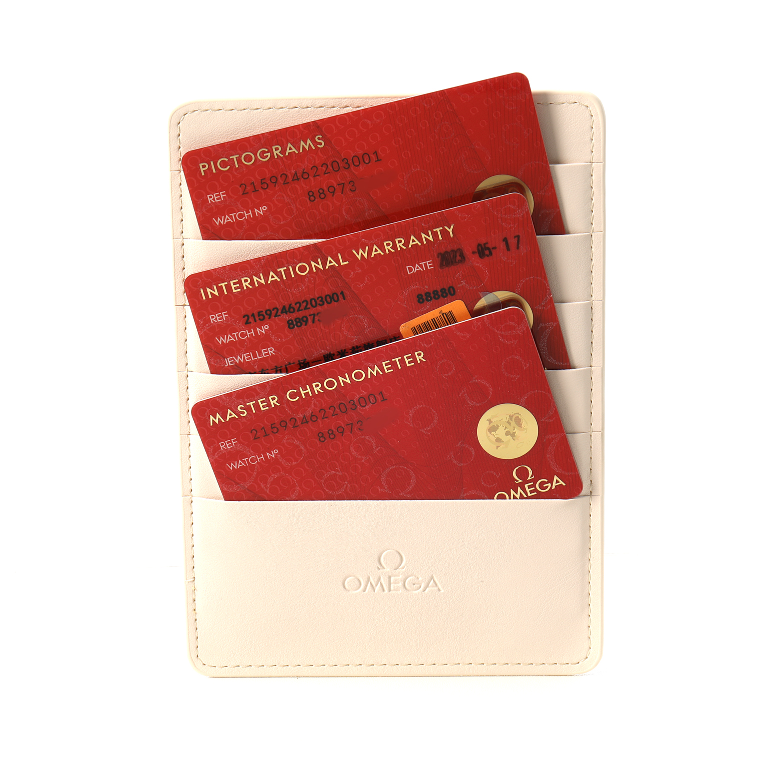 The image shows international warranty and certification cards for an Omega Planet Ocean 215.92.46.22.03.001 Men's Ceramic Blue Dial watch in a white leather holder.