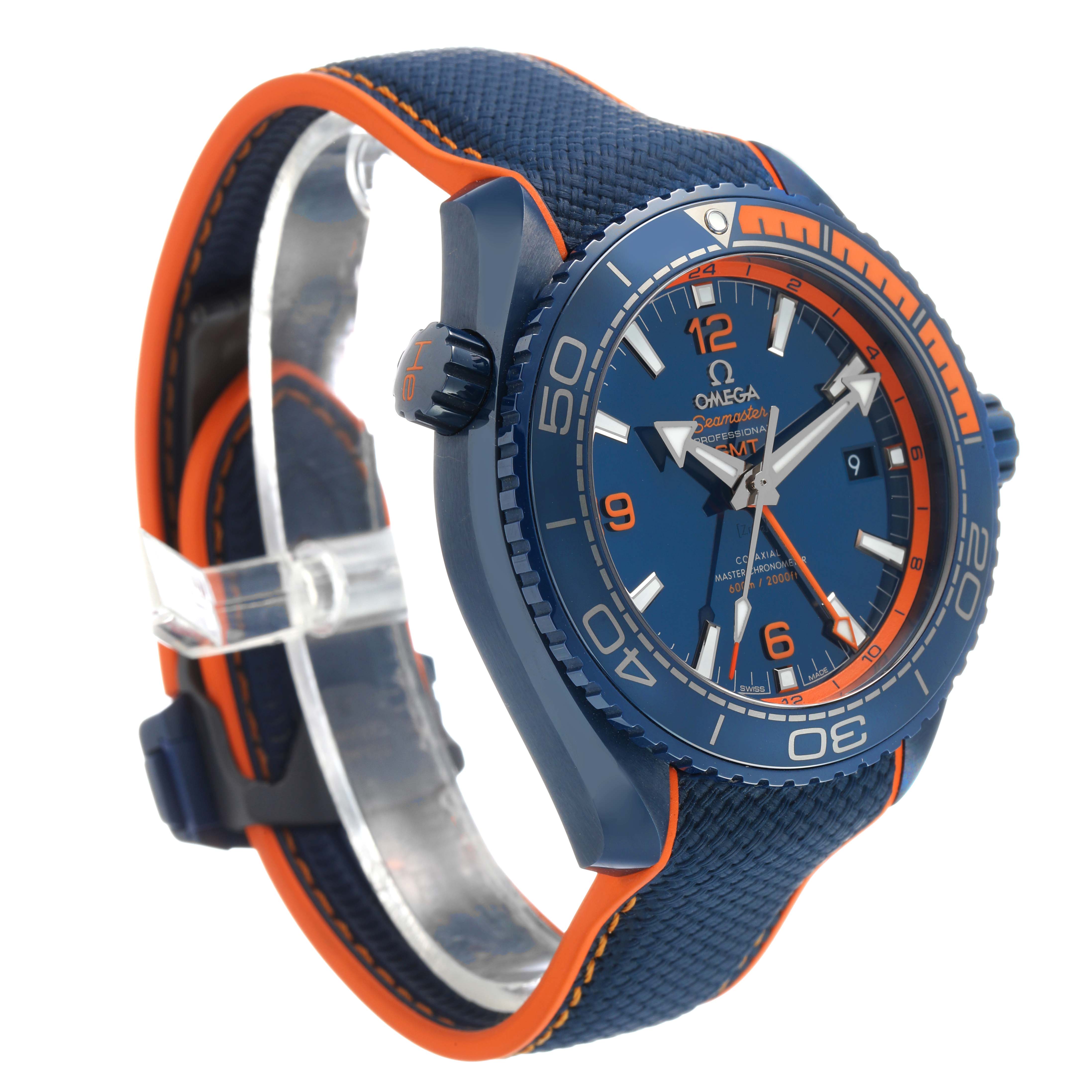 The Omega Planet Ocean 215.92.46.22.03.001 Men's Ceramic Blue Dial watch is shown at an angle highlighting the face, bezel, and blue-orange strap.
