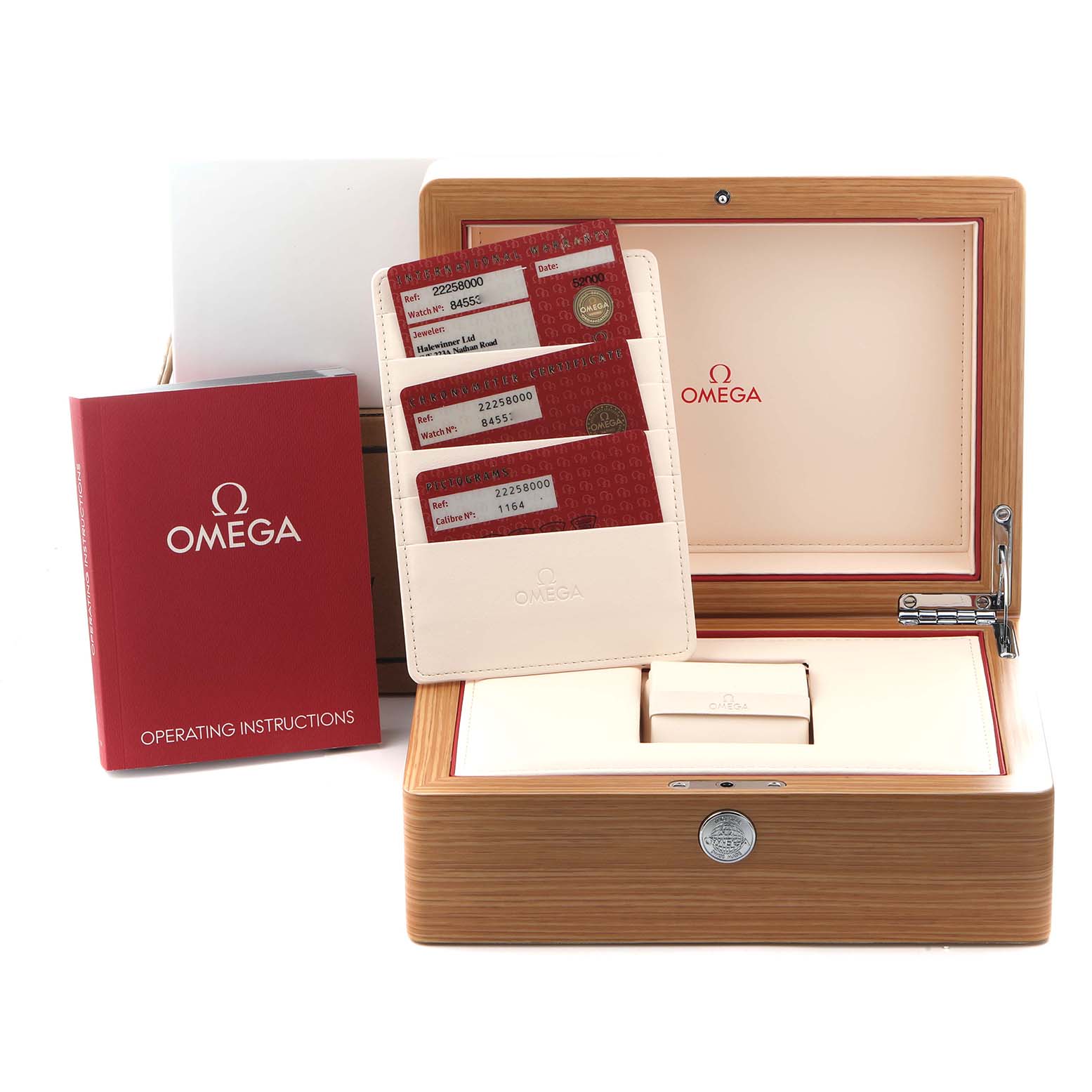 The image shows a wooden Omega Seamaster 2225.80.00 Men
s Stainless Steel Blue Dial 2225.80.00 Men
s Stainless Steel Blue Dial watch box, warranty cards, and an instruction booklet, viewed from the front.