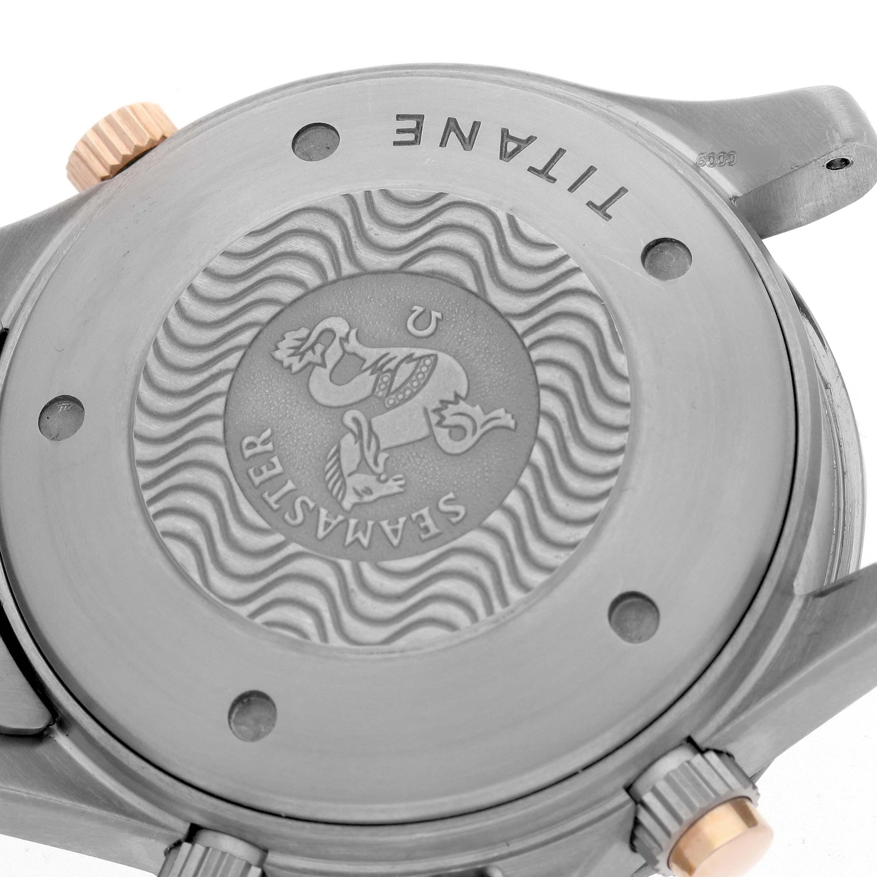 The image shows the back case of an Omega Seamaster 2296.80.00 Men
s Titanium Blue Dial 2296.80.00 Men
s Titanium Blue Dial watch, highlighting the emblem and material details.