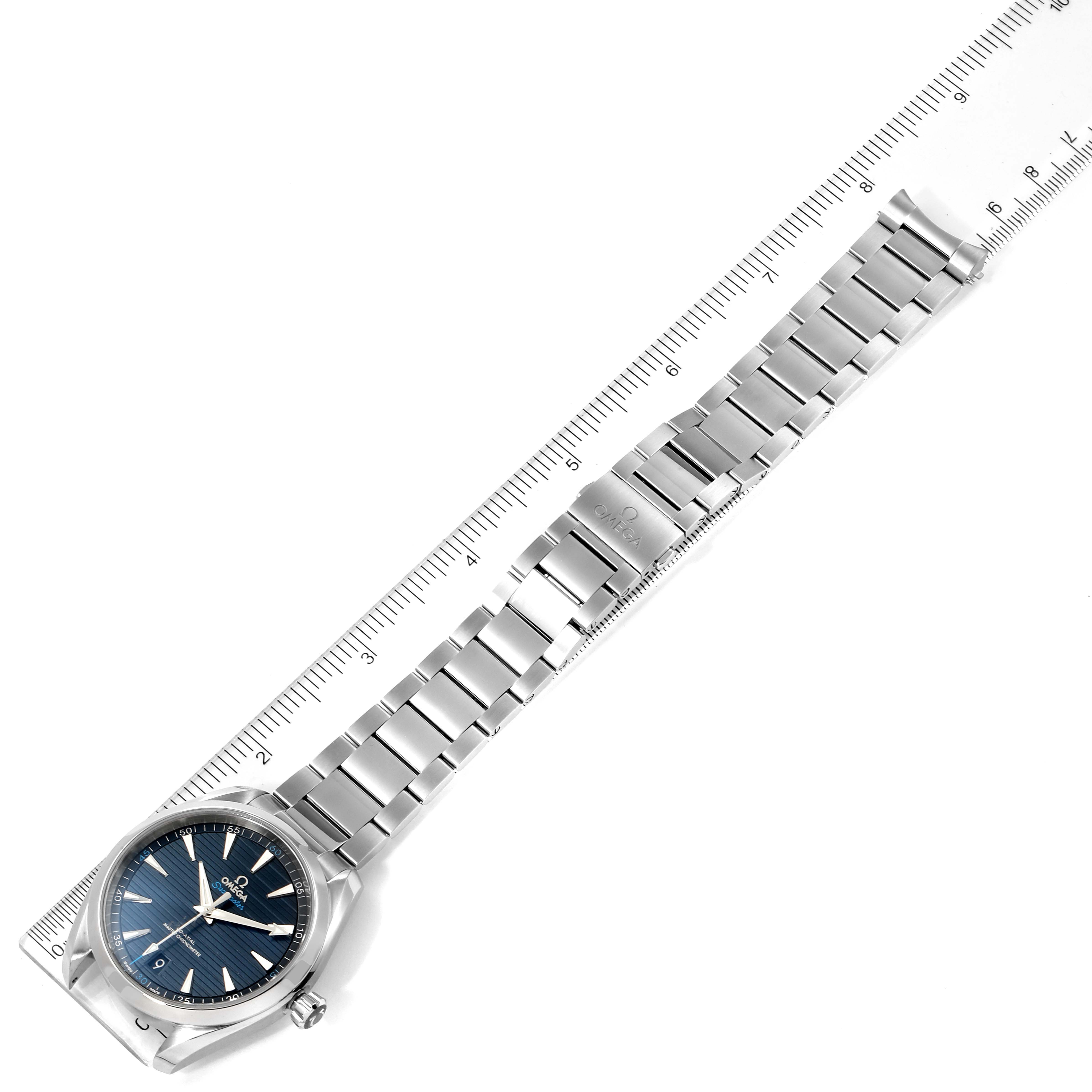 The Omega Aqua Terra 220.10.41.21.03.001 Men's Stainless Steel Blue Dial 220.10.41.21.03.001 Men's Stainless Steel Blue Dial watch is shown from the top, showcasing its face, bracelet, and clasp, alongside a ruler for scale.